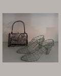 Pair of wire heels in pastel green