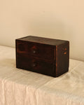Small wooden chest of drawers