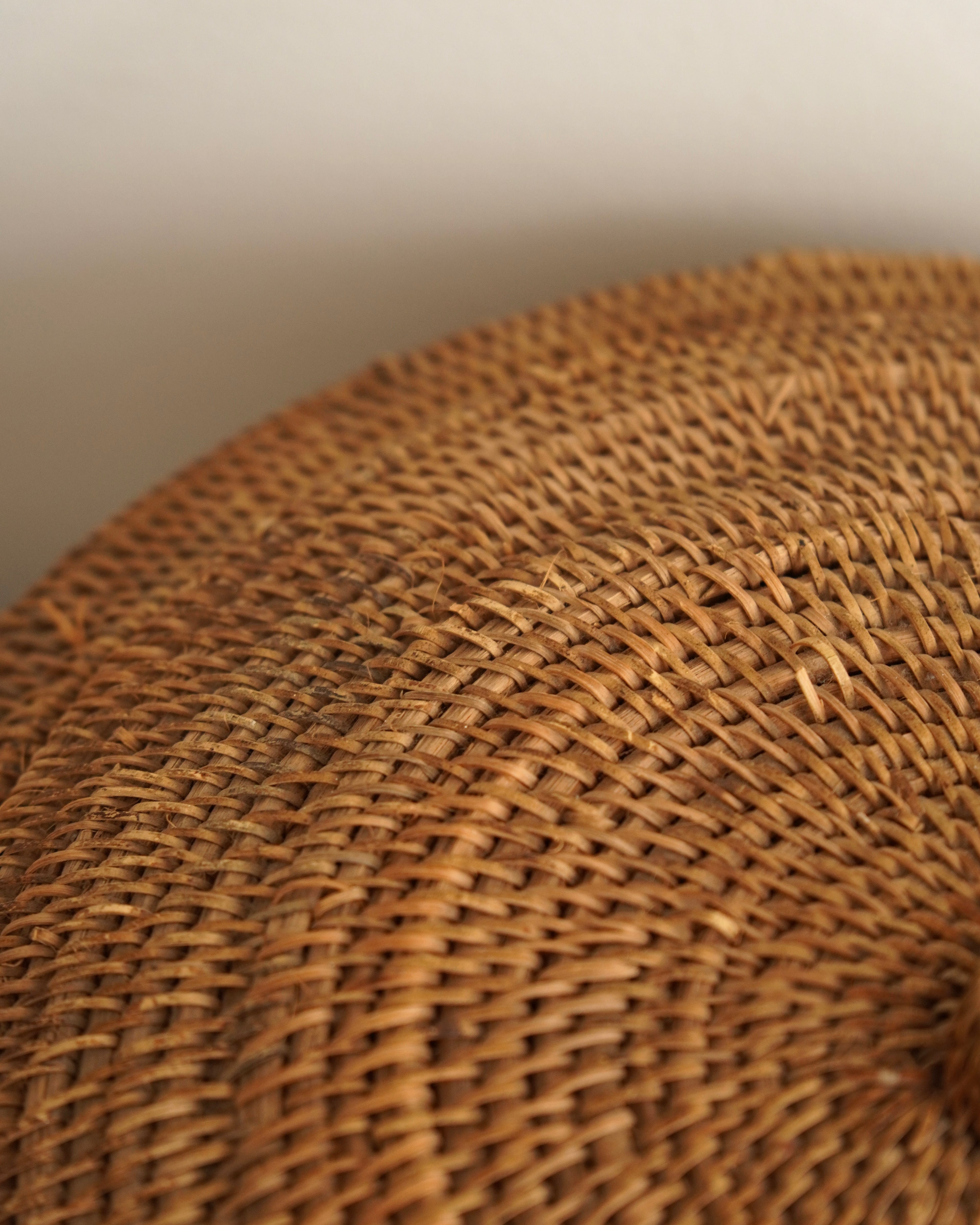 Large woven rattan container with lid