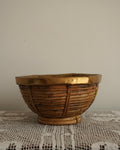 Brass trim and woven rattan bowl likely by Gabriella Crespi