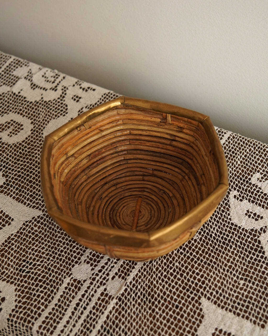 Brass trim and woven rattan bowl likely by Gabriella Crespi