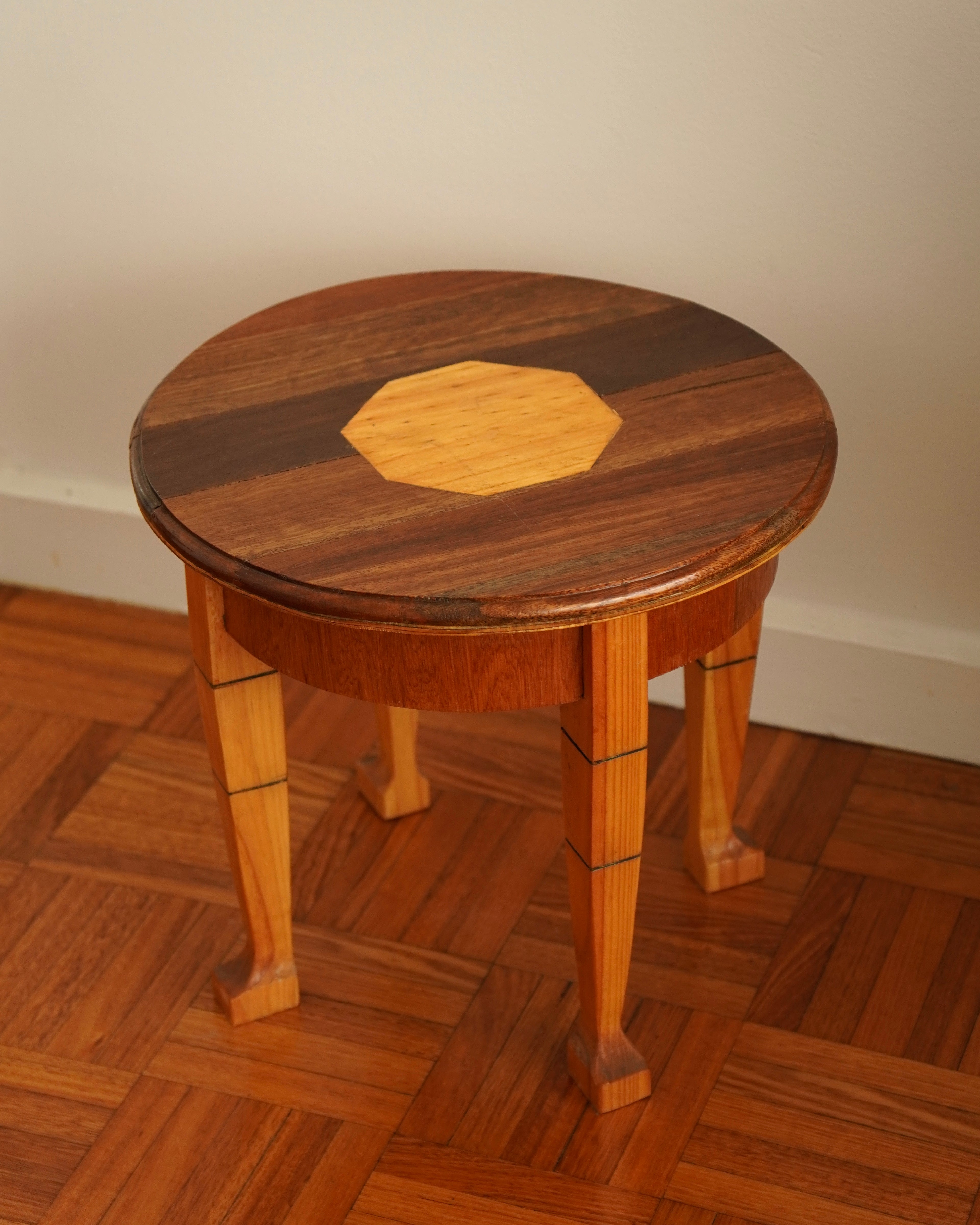Round wood marquetry table
