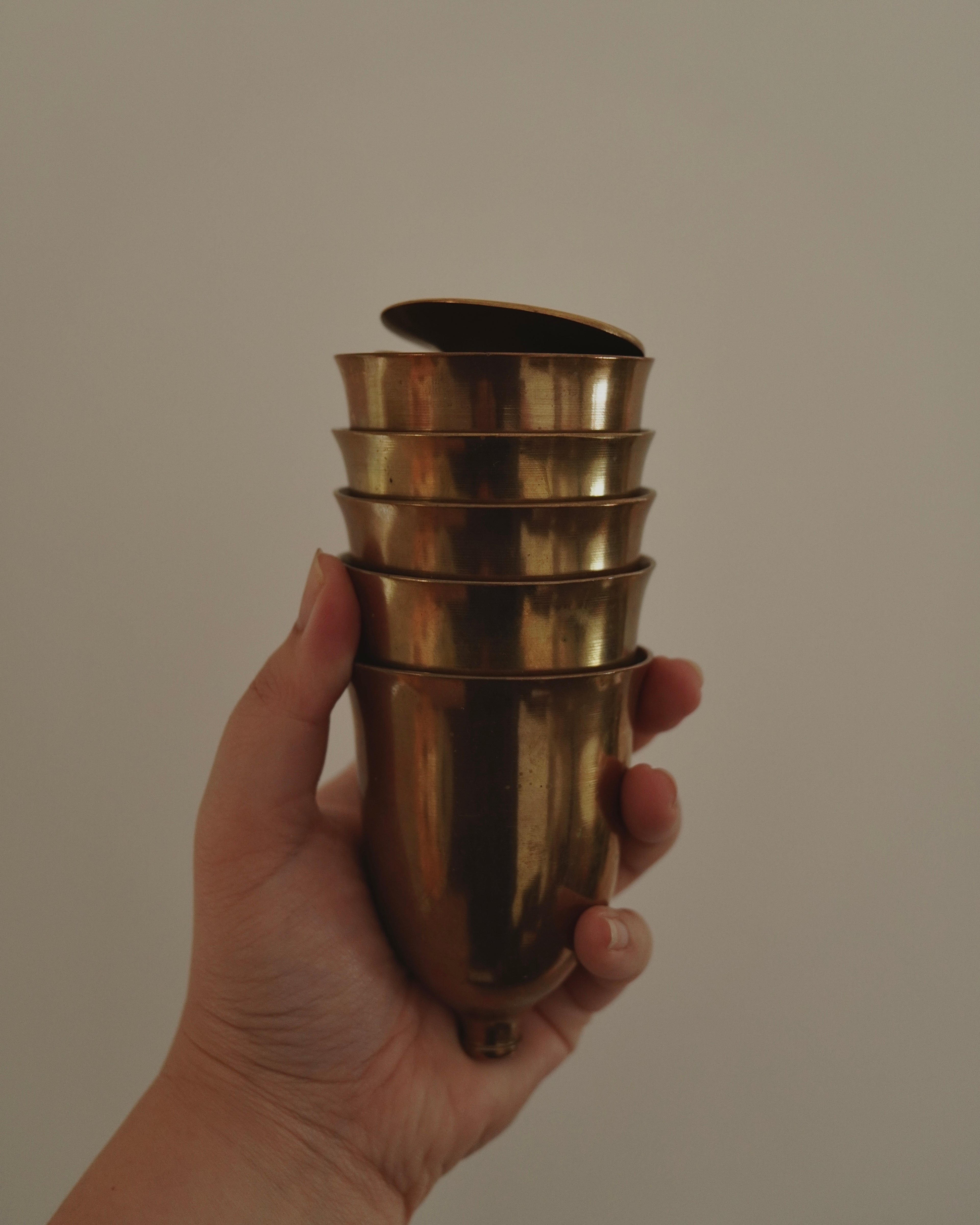 Set of 6 brass footed cups that disassemble