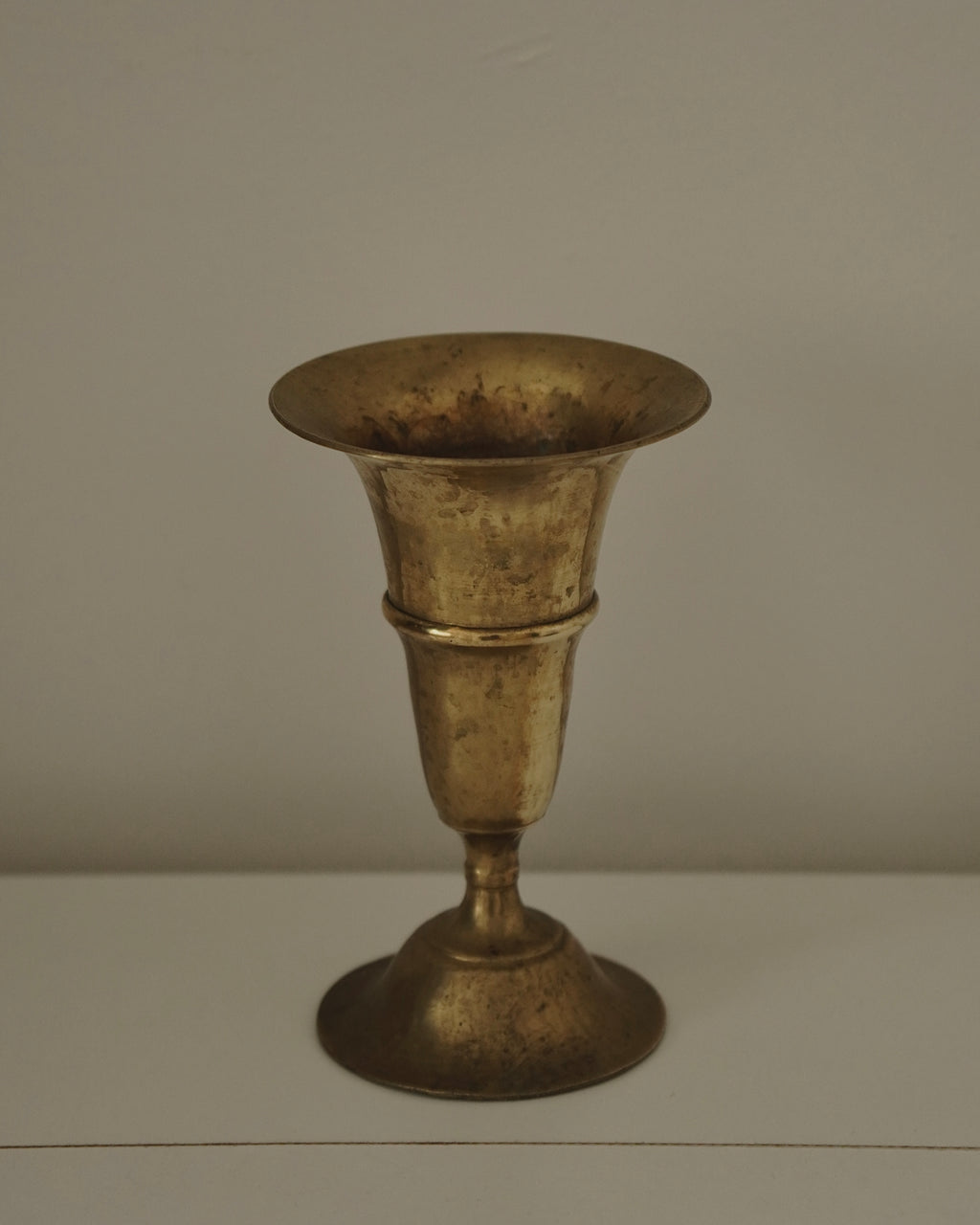 Brass tapered vase with round tapered base