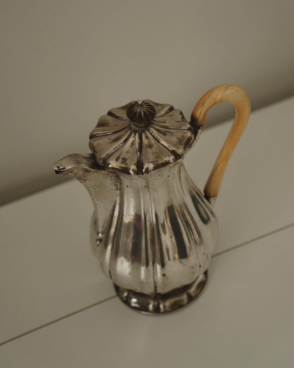 Silver plated jug with handle and lid