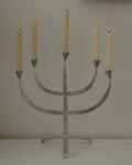 Silver coloured metal candelabra, holds 5