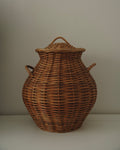 Cane urn-form woven laundry basket with handles and lid
