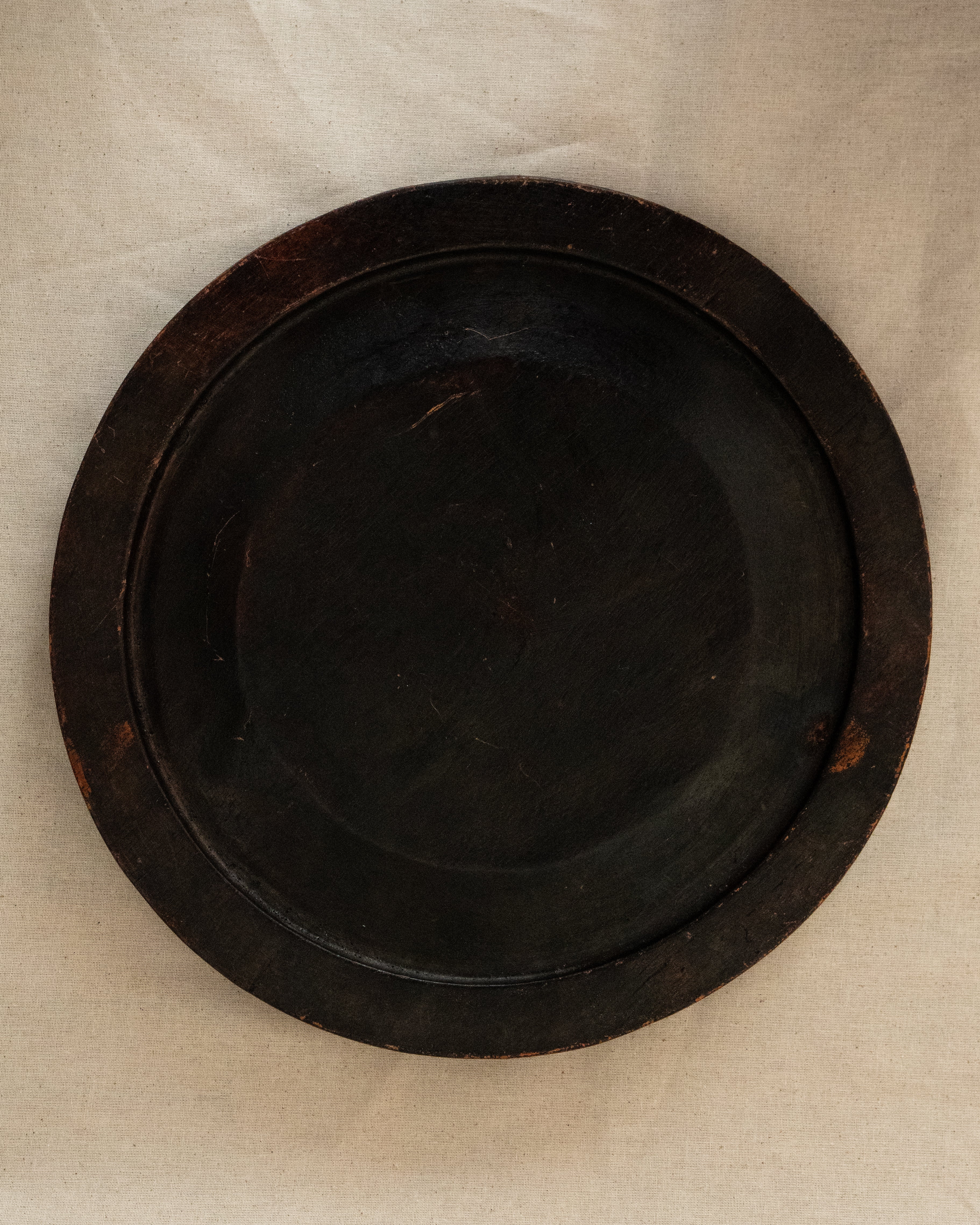 Dark wooden plate/tray/wall decor with floral carvings