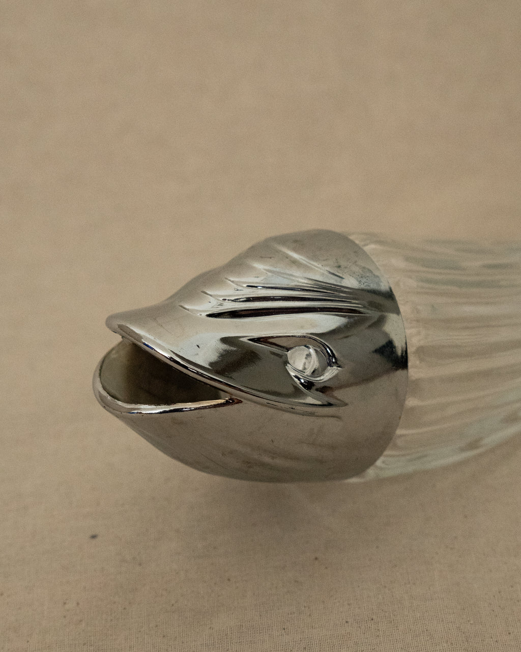 Silver coloured fish glass