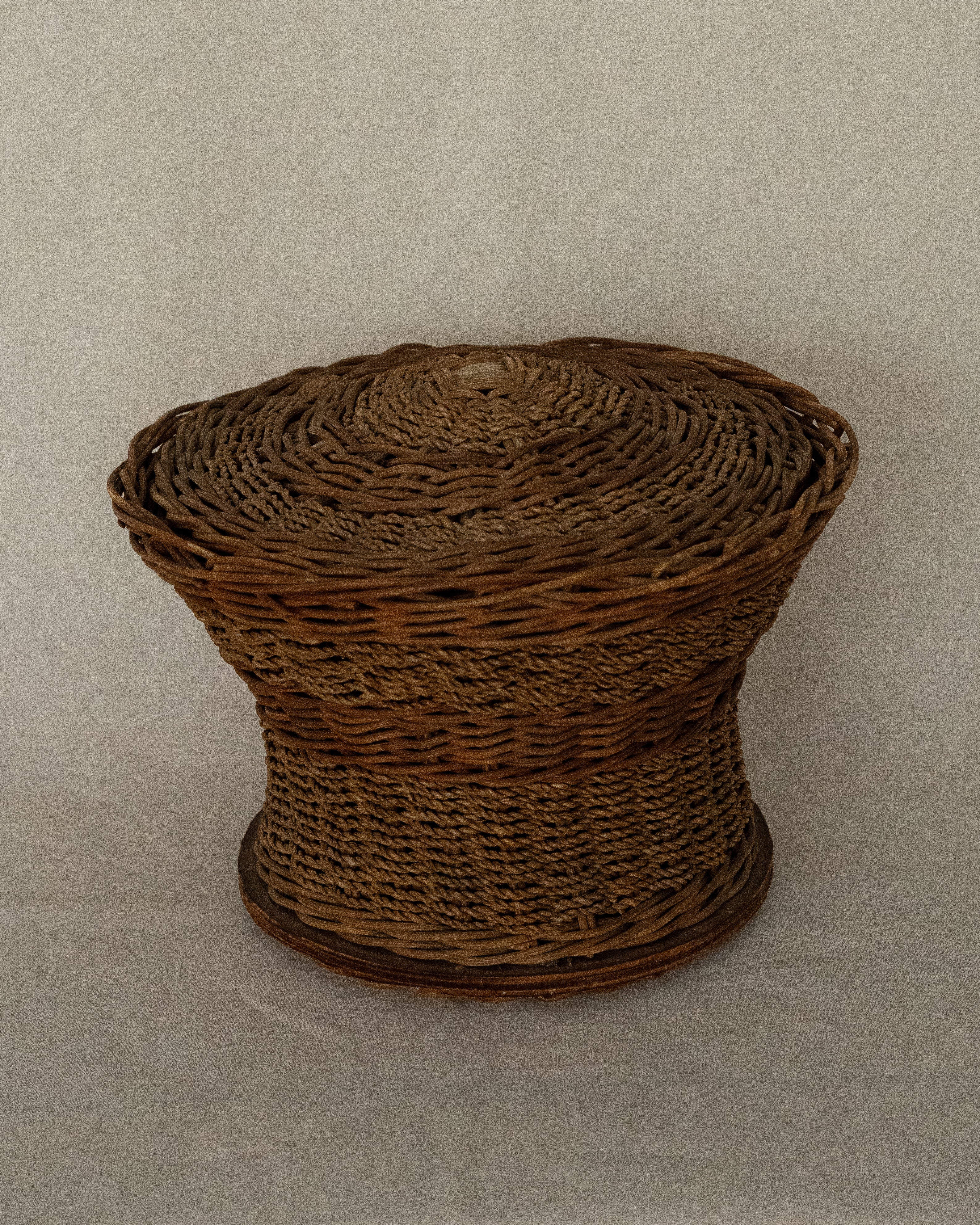 Rattan and rope woven basket with lid
