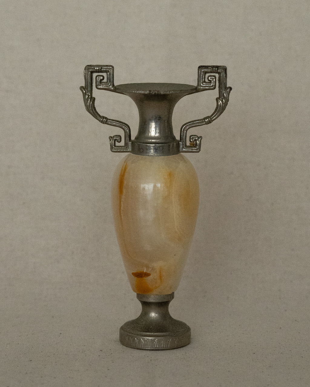 Small stone urn single stem vase with intricate handles (white)