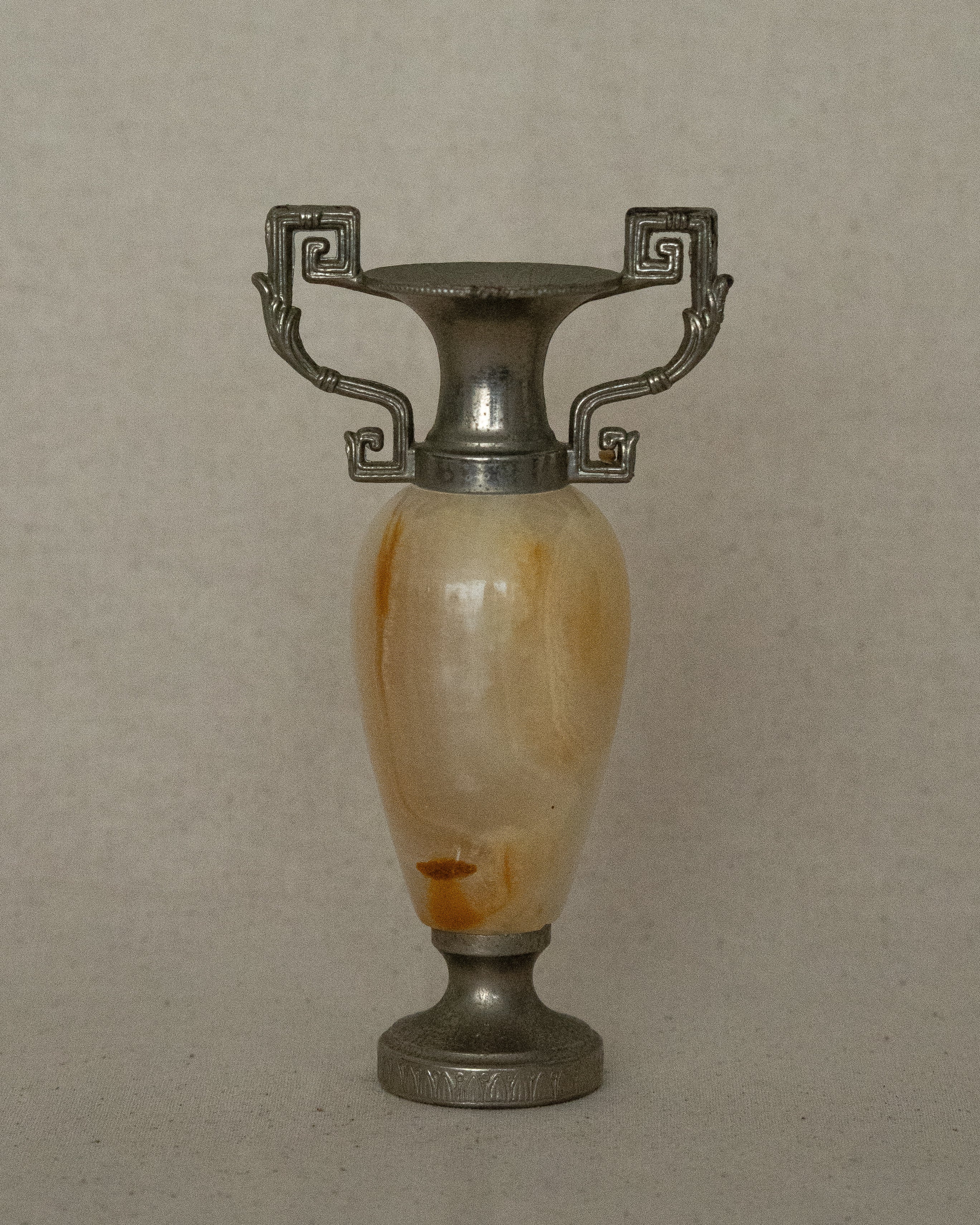 Small stone urn single stem vase with intricate handles (white)