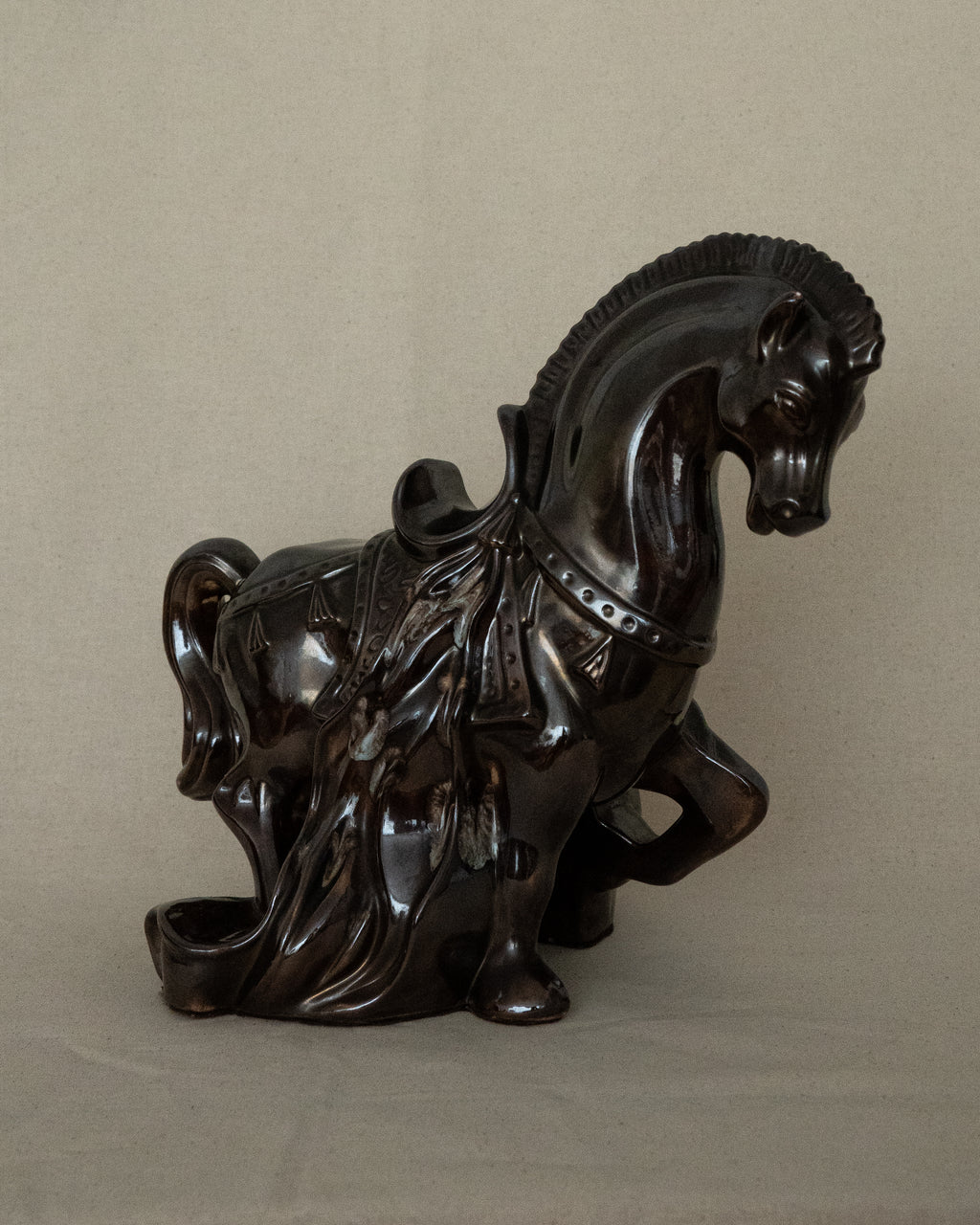 Brown ceramic horse with drip details
