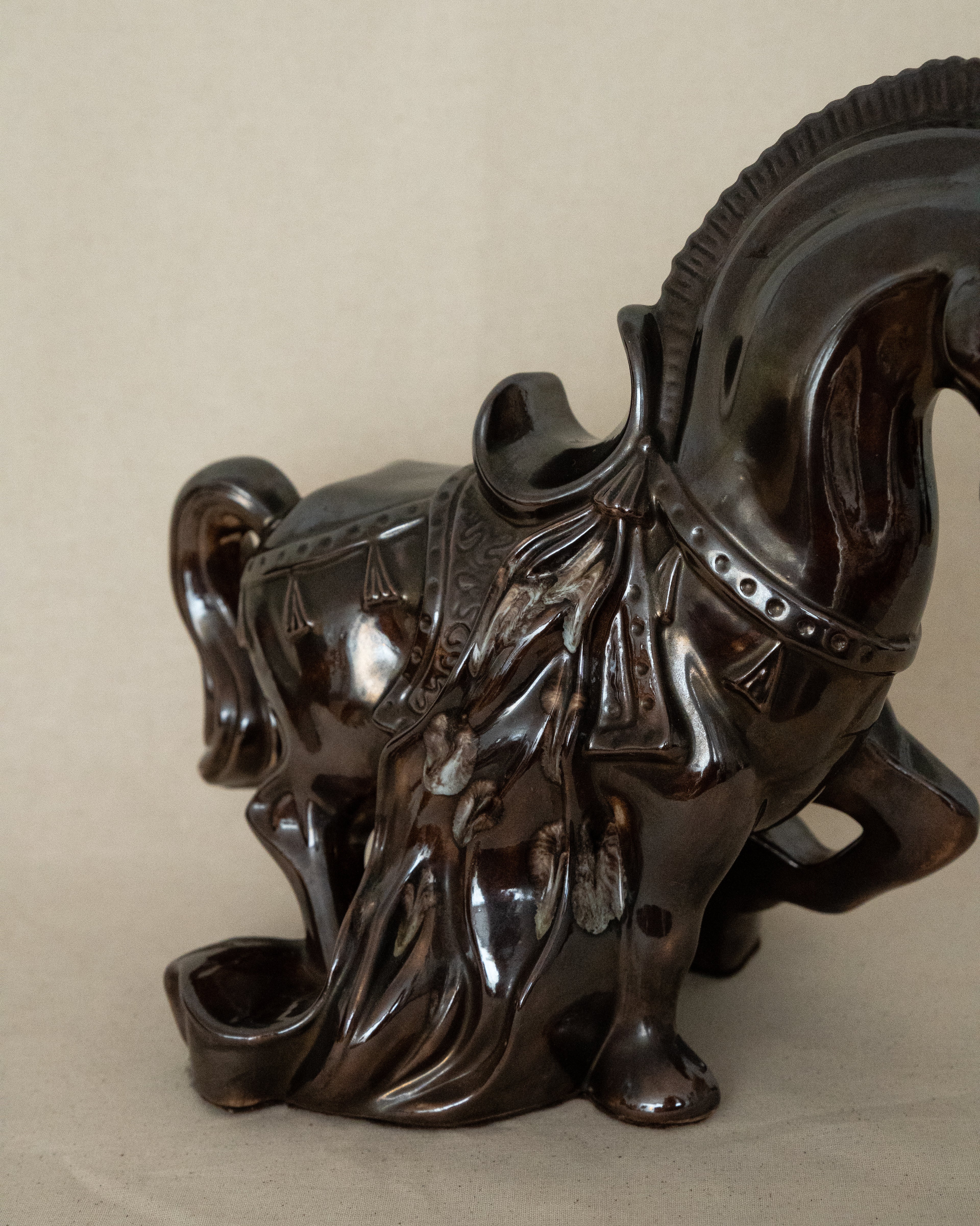 Brown ceramic horse with drip details