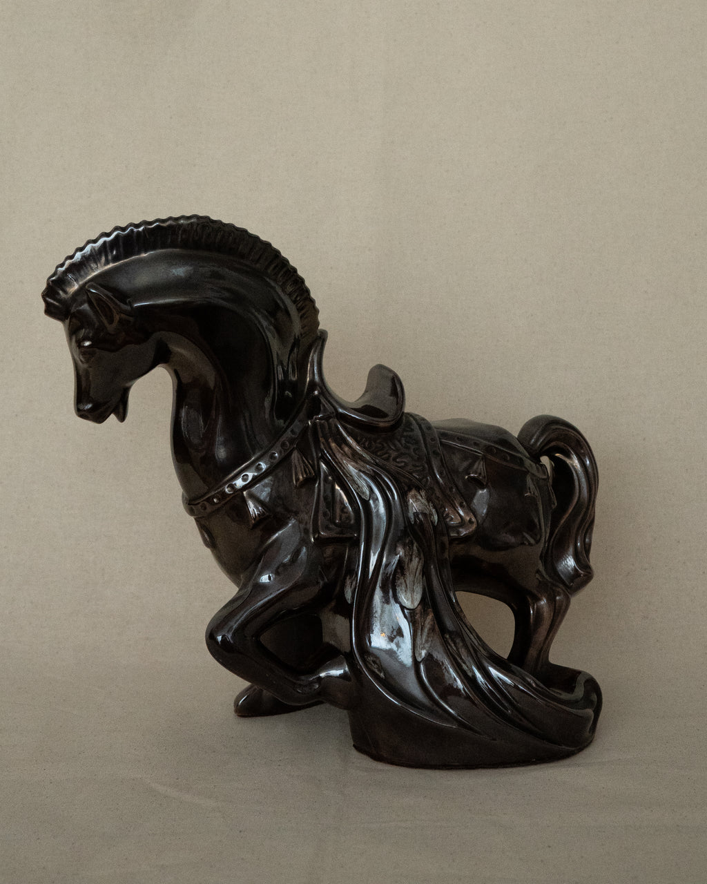 Brown ceramic horse with drip details