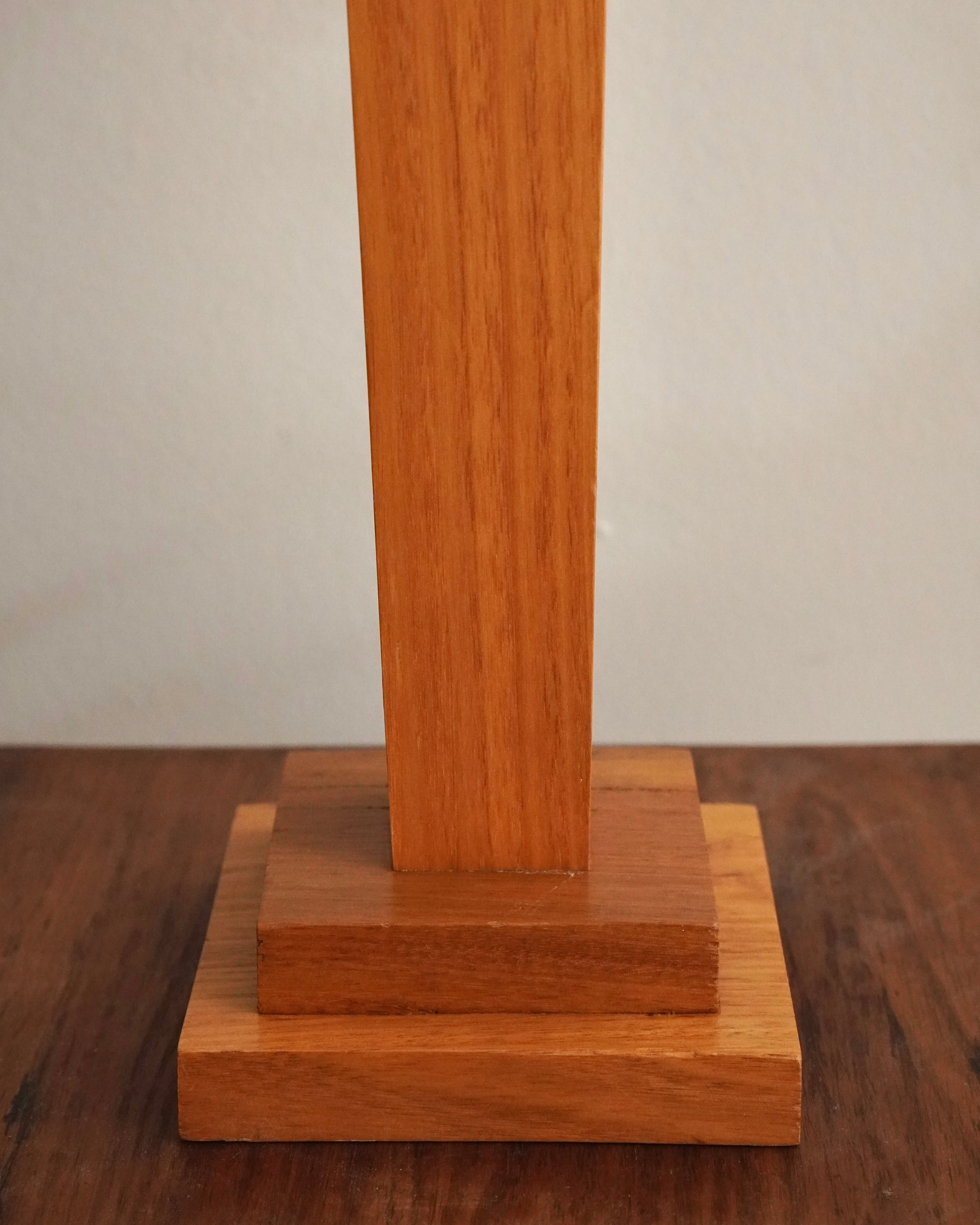 Art deco style lamp with faux leather like lampshade, tapered body square stepped base