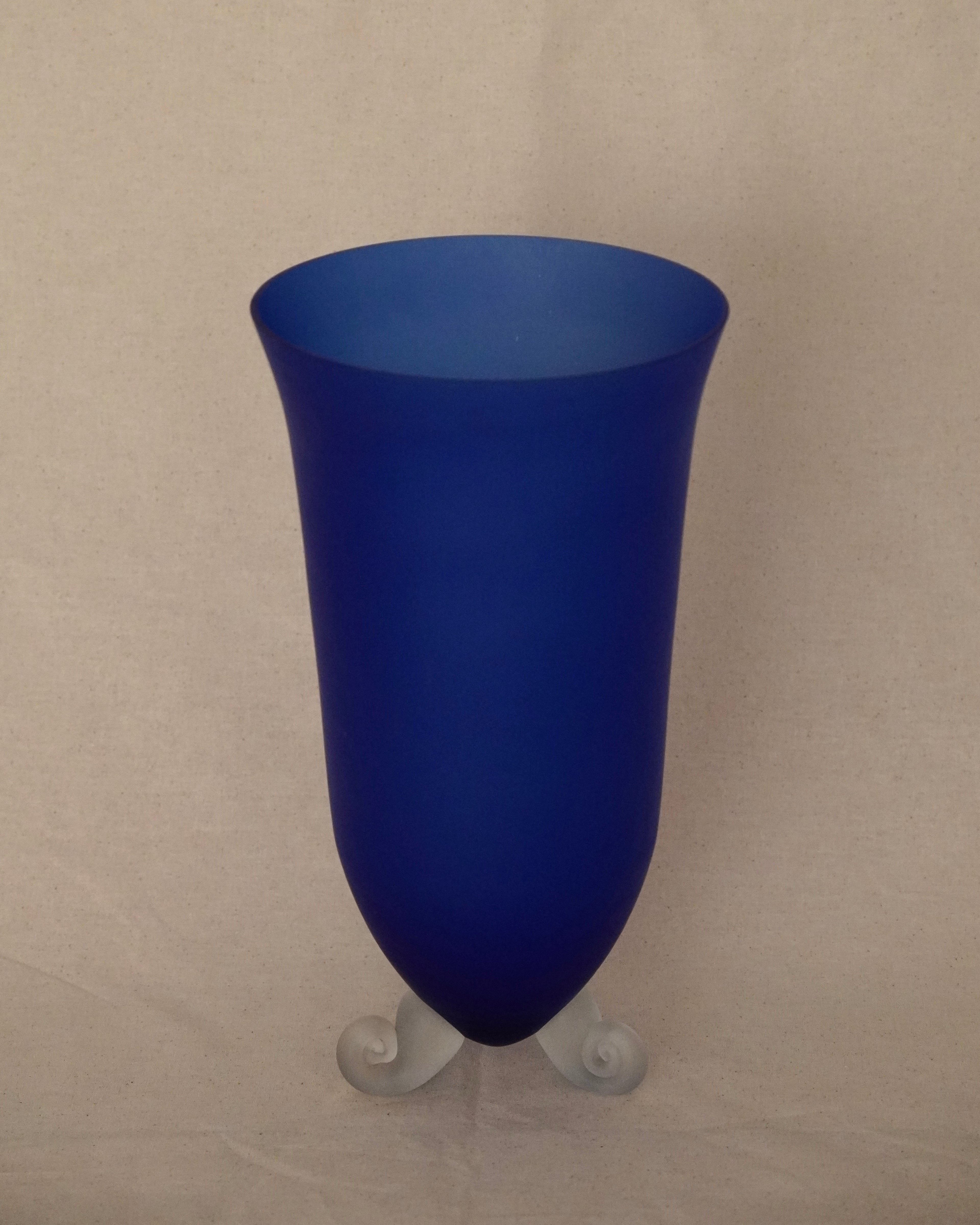 Blue art glass vase with spiral feet