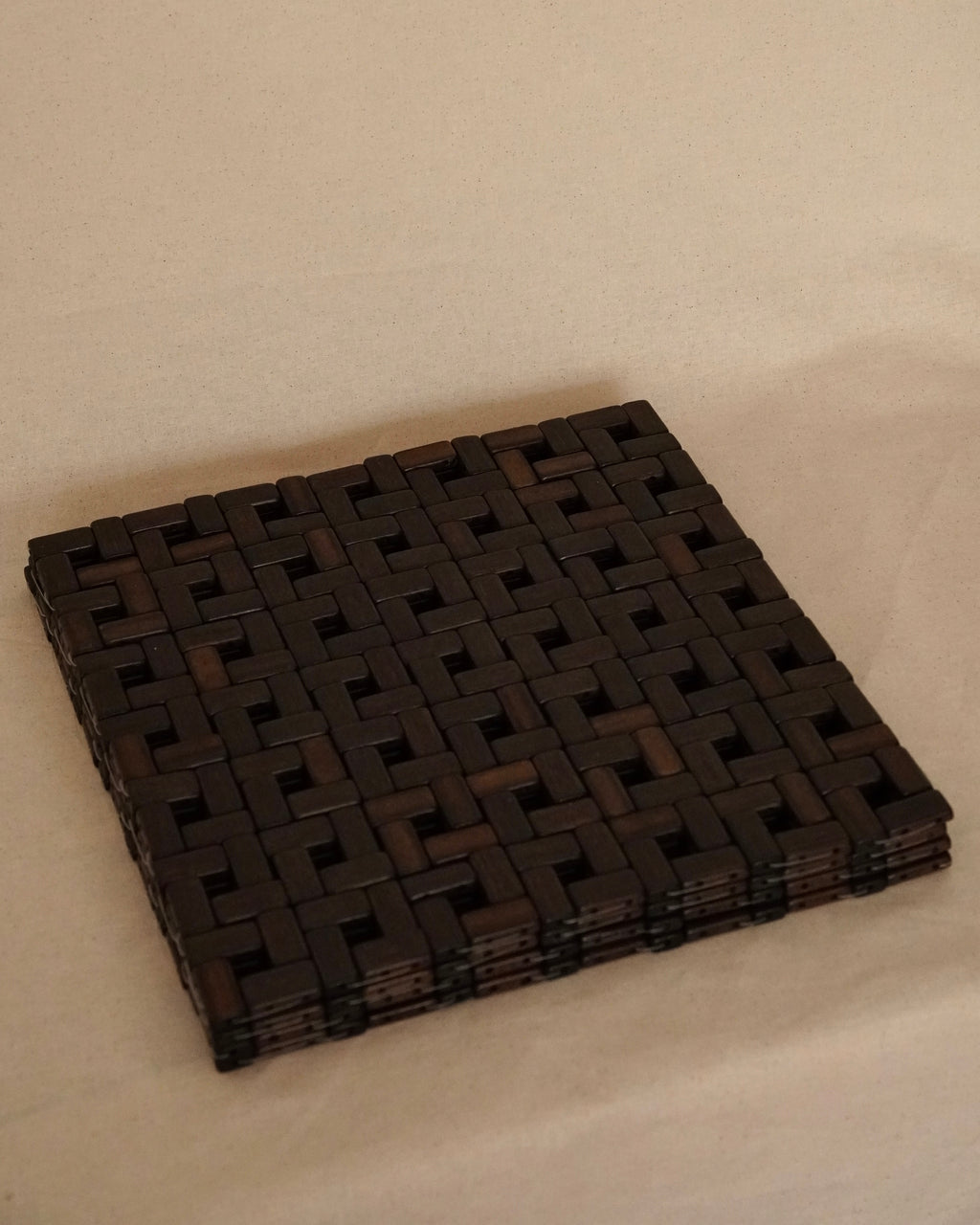 Set of 4 dark wooden placemats
