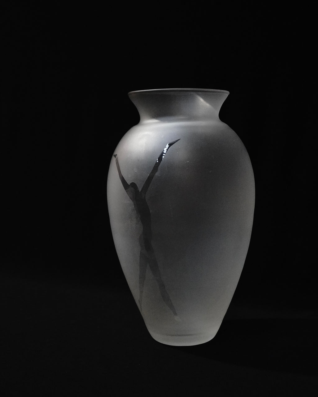 Translucent vase with human figure