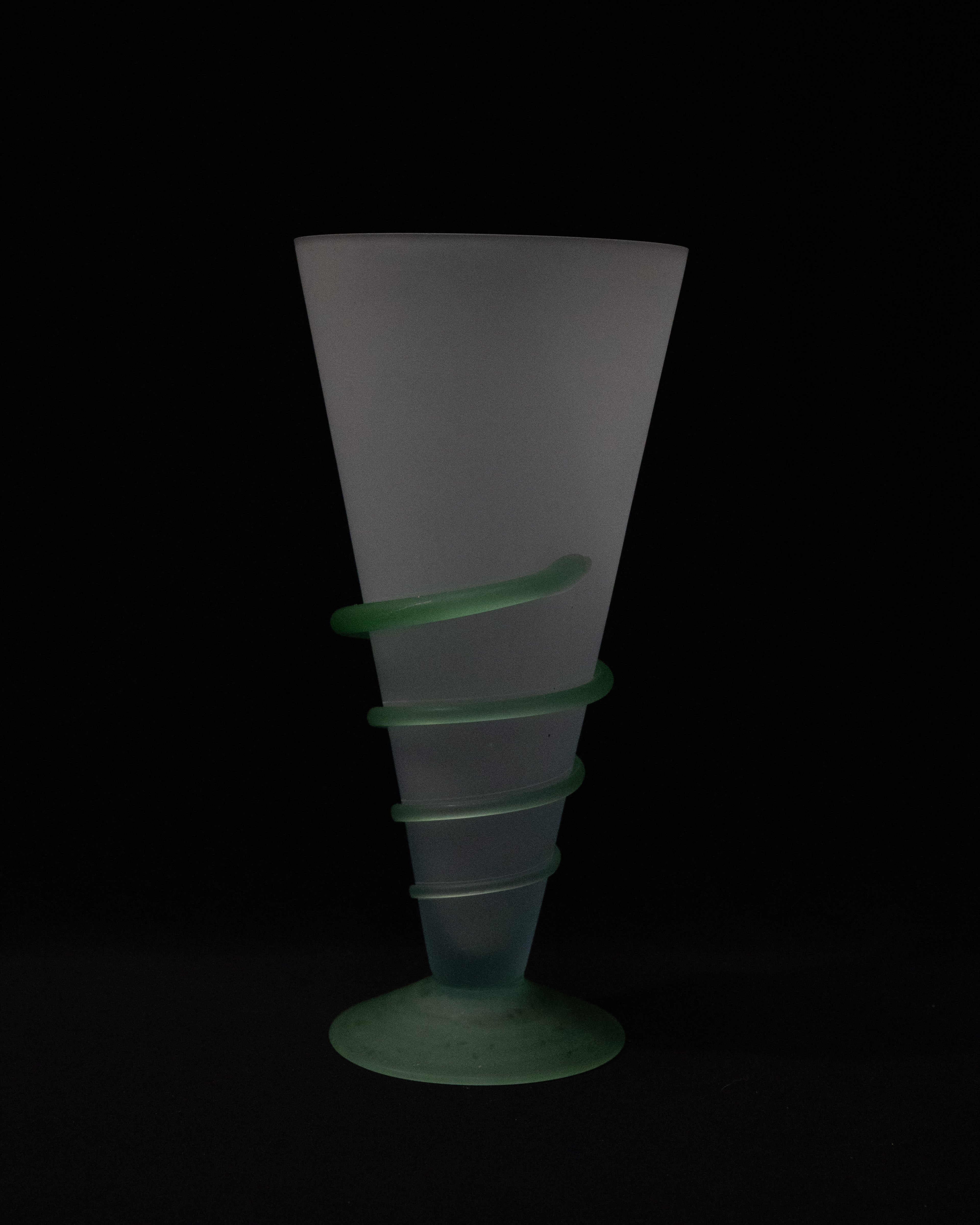 Art glass translucent vase with light green base and swirl detail