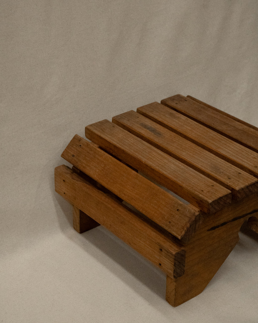 Slatted wooden stool