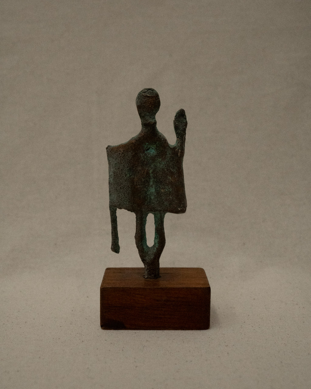 Cast Sardinian "Capotribu" (Chief of the herdsmen) bronze verdigris sculpture on wooden base