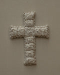 Cross wall hanging decorated with shells