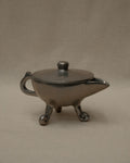 Aluminum teapot trinket holder with spiral feet