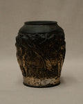 Art deco metal vase with nude figures and angel amongst nature