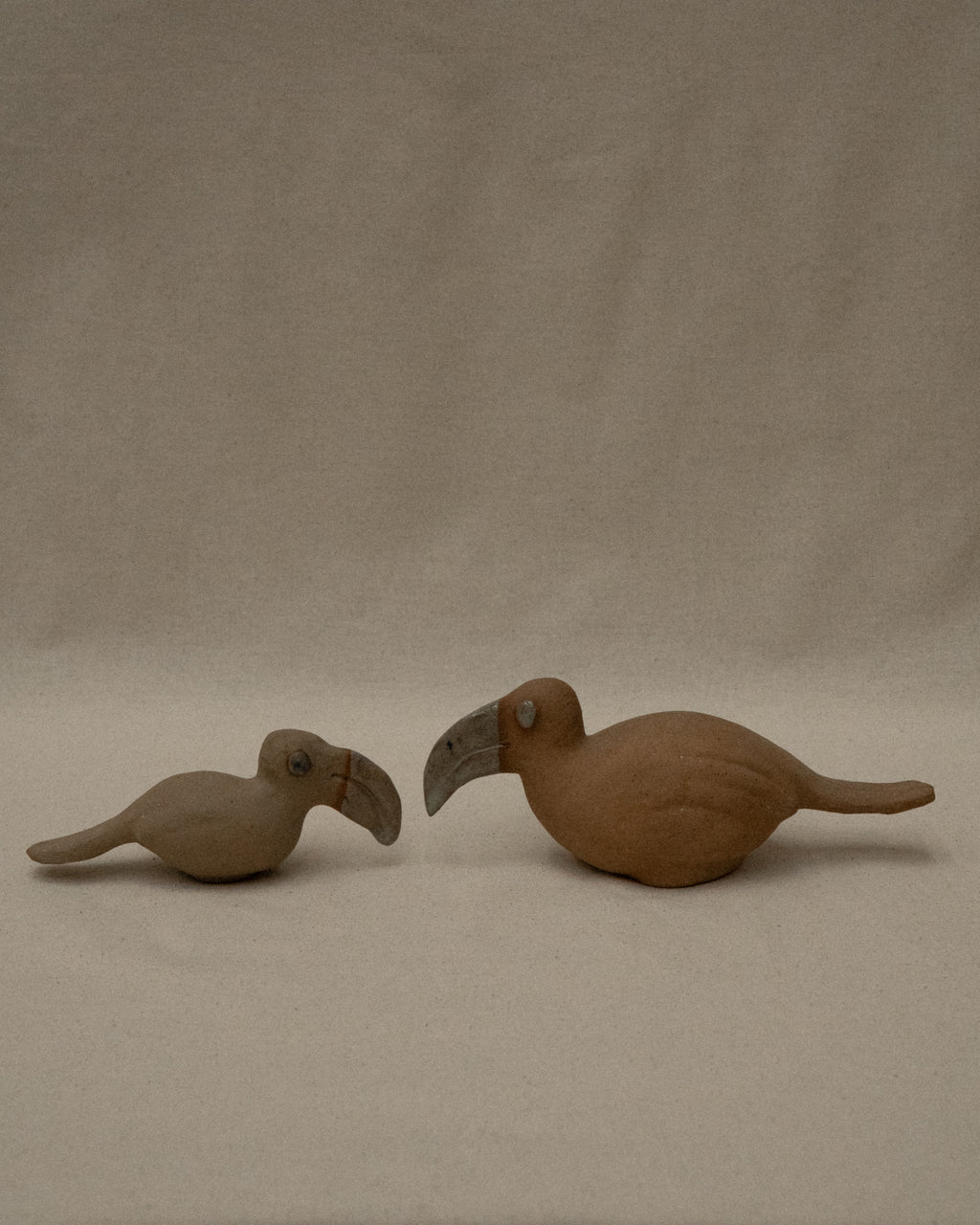 Ceramic toucans and guinea fowls