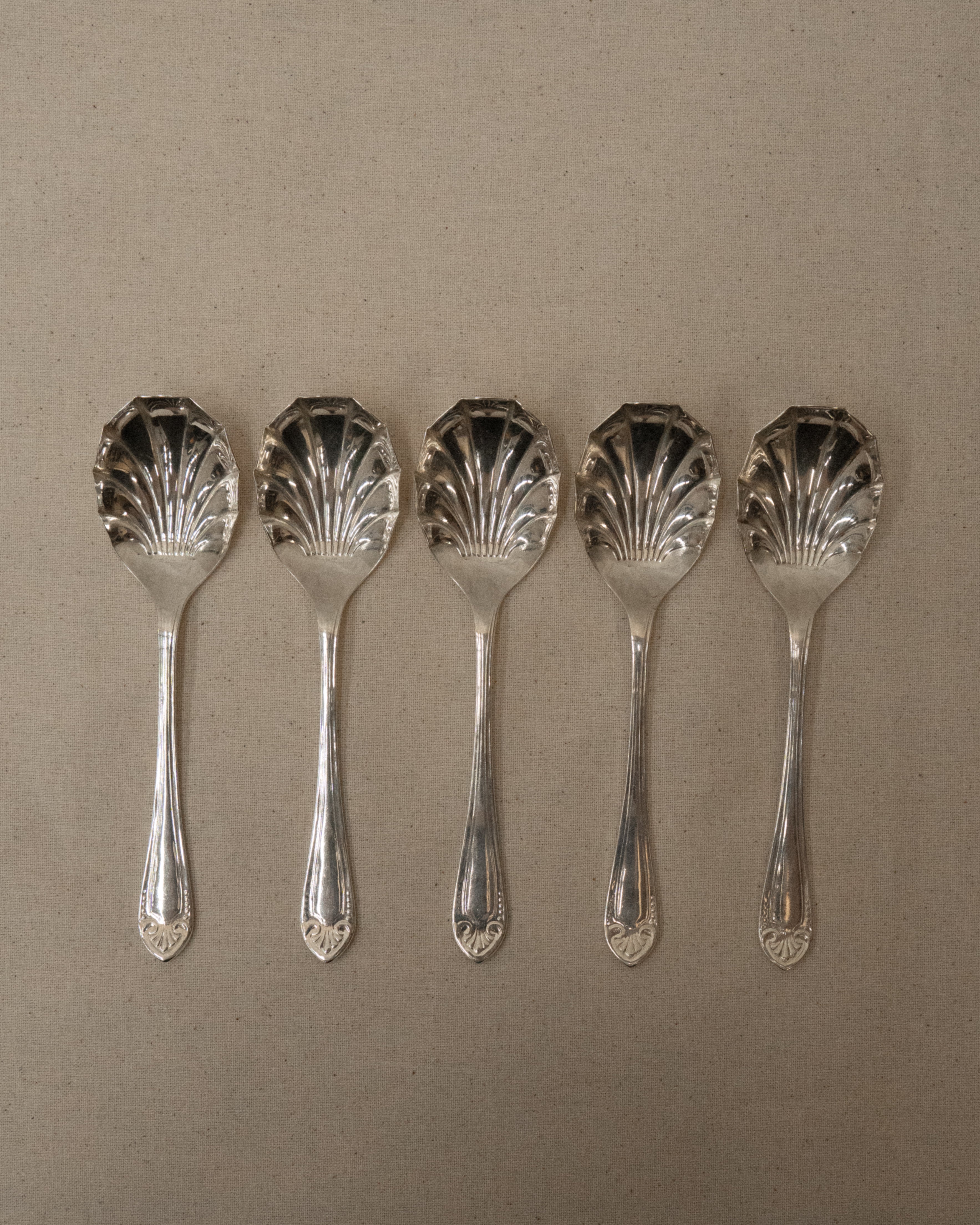 Set of 5 shell shaped silver plated dessert spoons