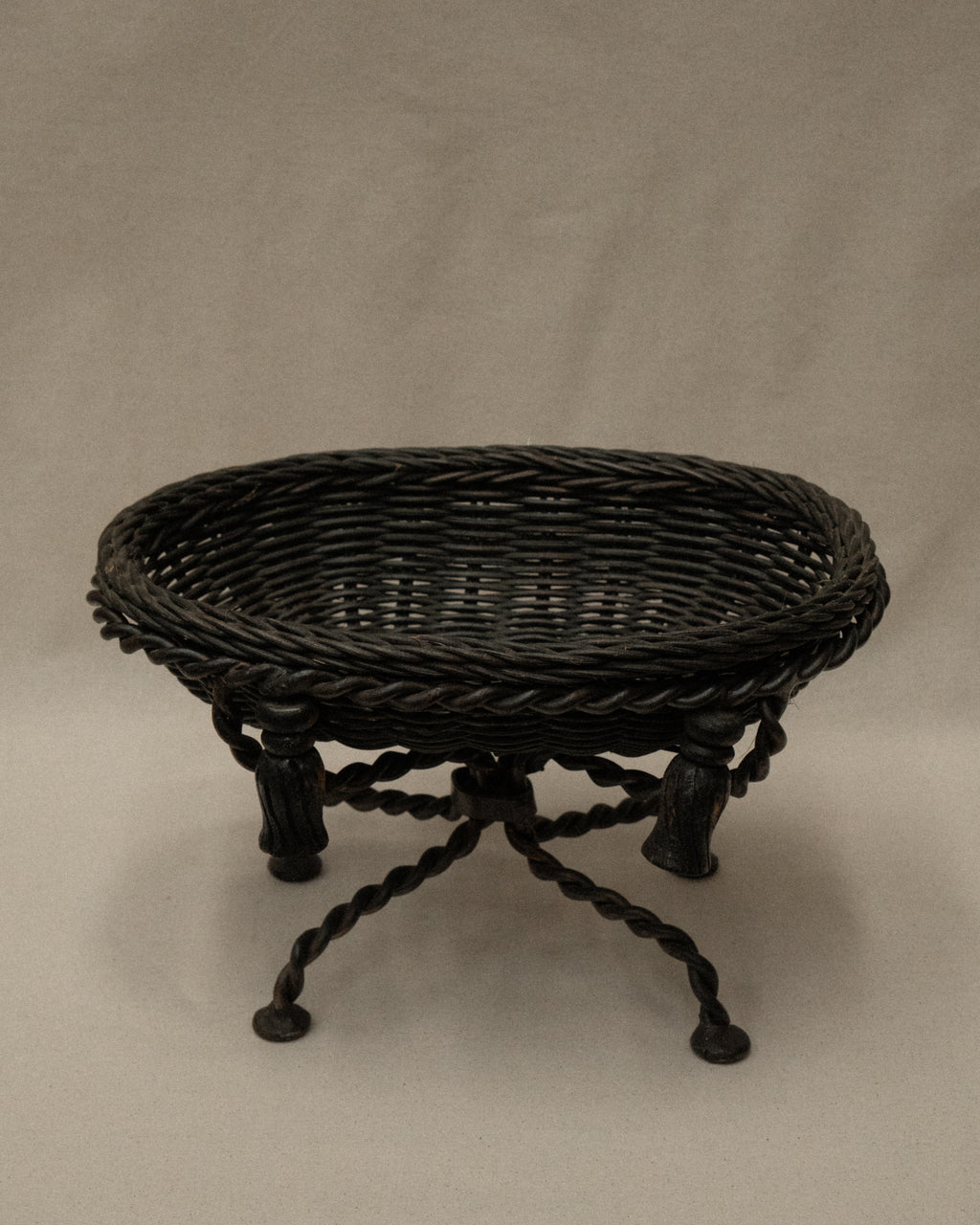 French basket with metal twist legs and resin tassels