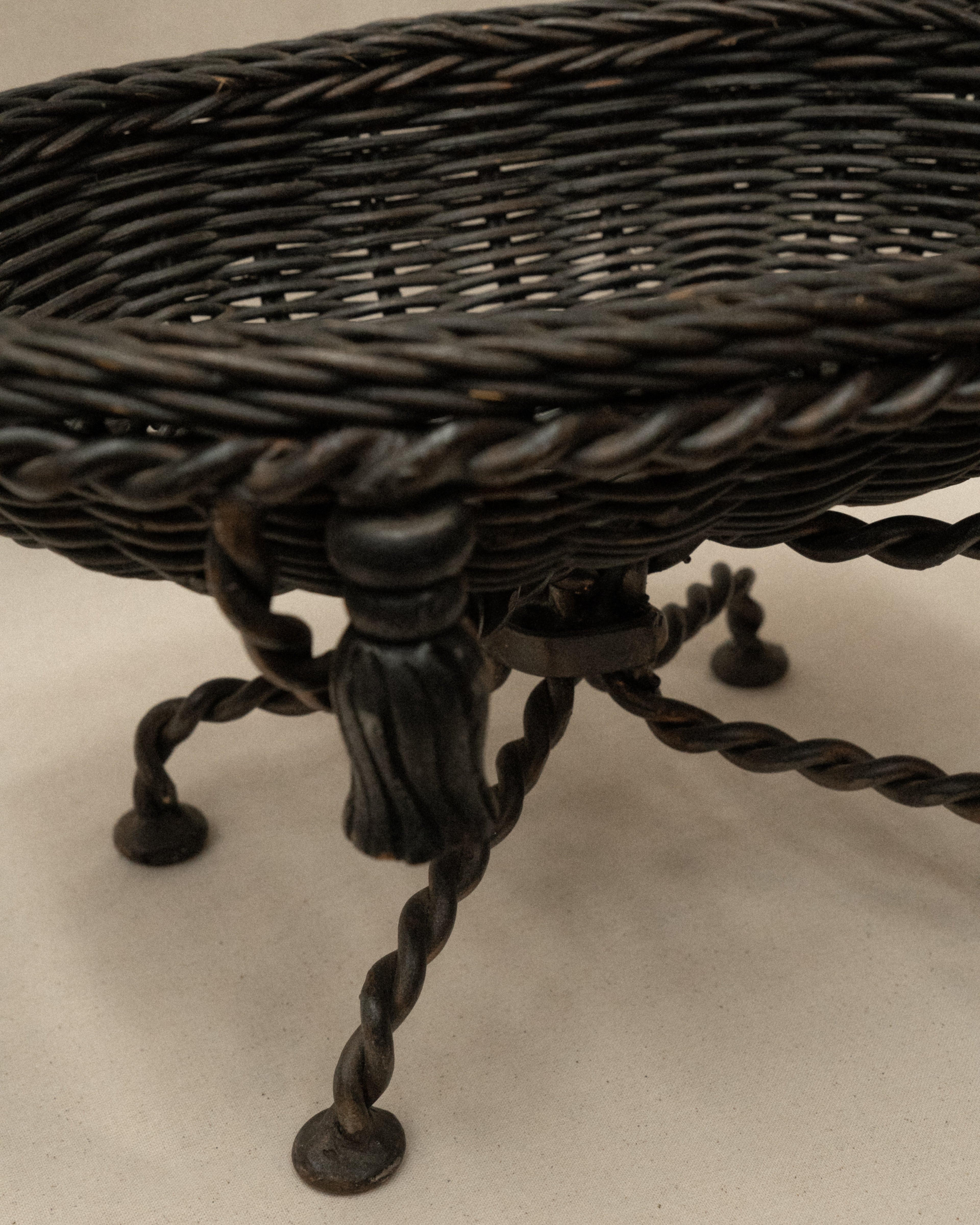 French basket with metal twist legs and resin tassels