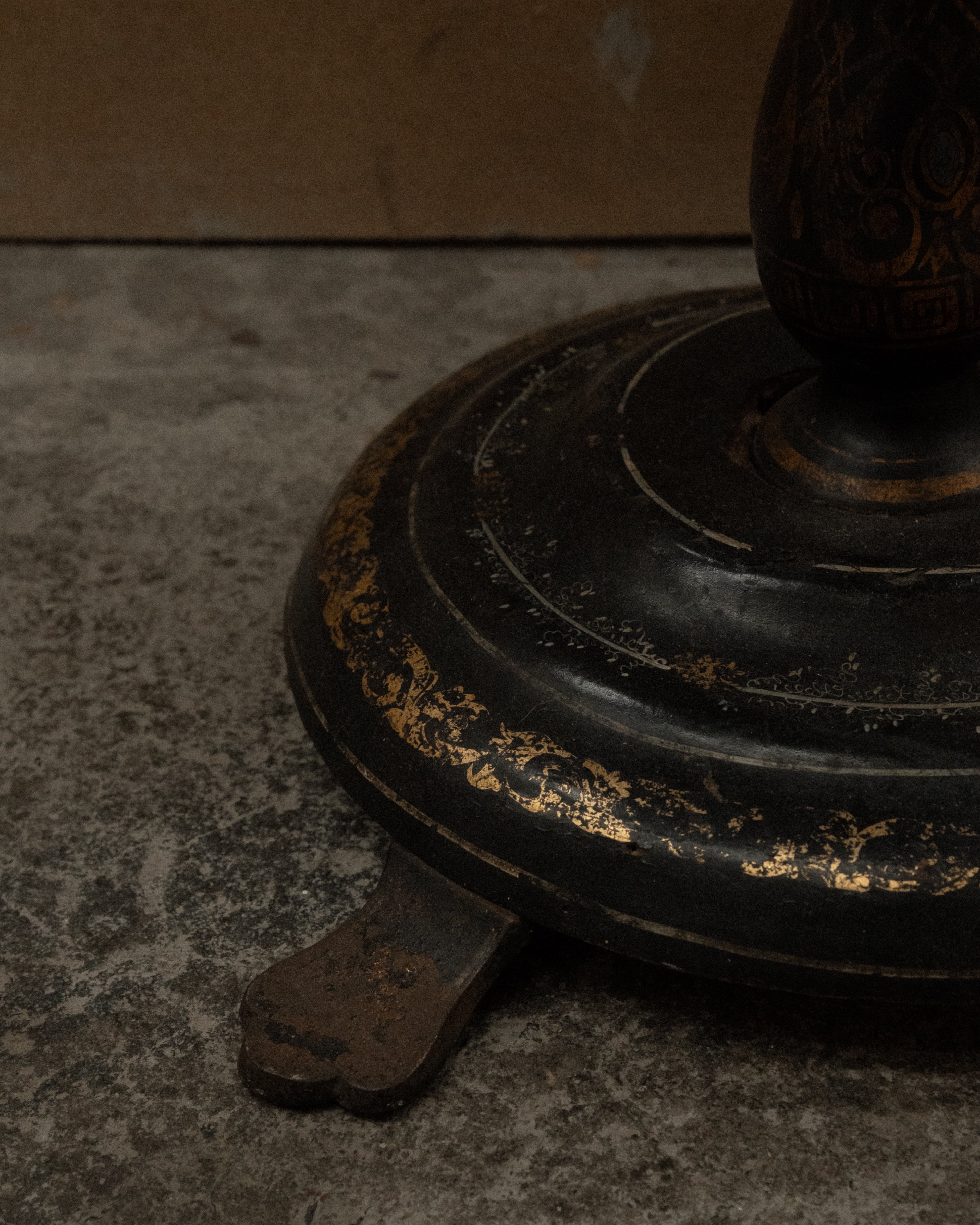 Paper mache and mother of pearl inlaid table likely made between mid to late 19th century