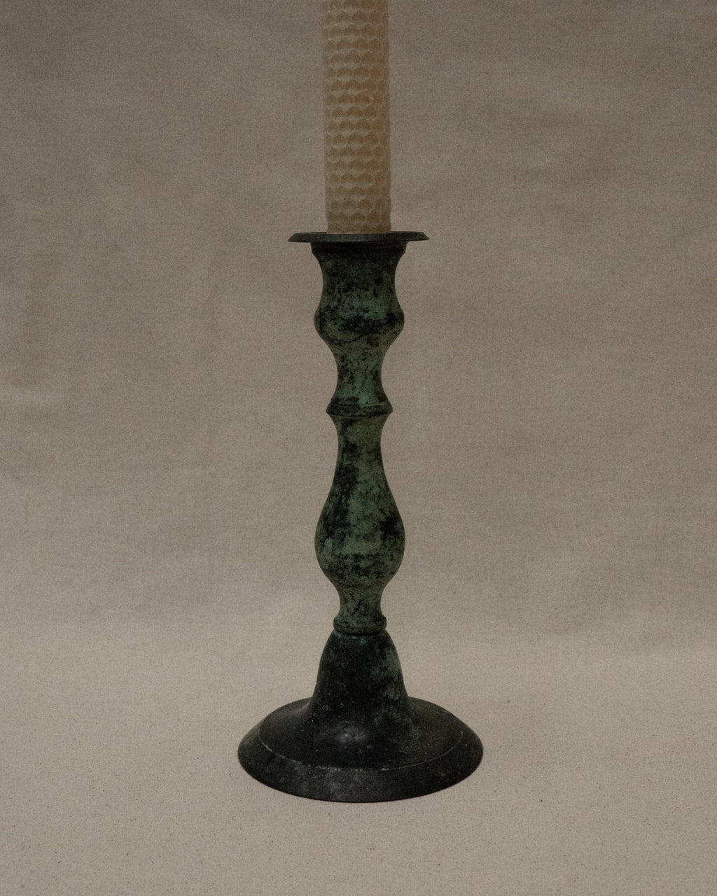 Pair of intentional verdigris candle holders