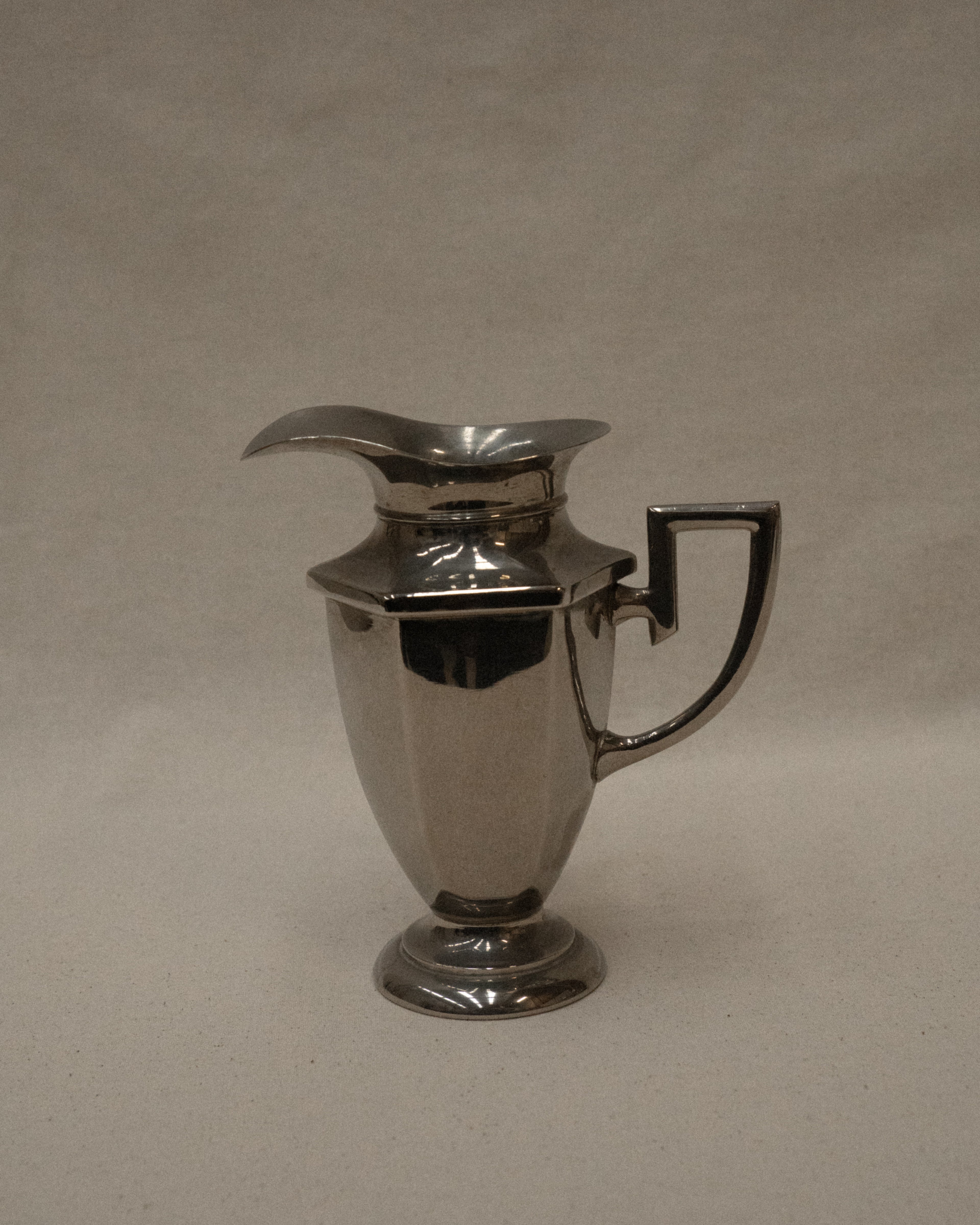 Set of chrome art deco set of coffee pot, sugar pot and milk jug