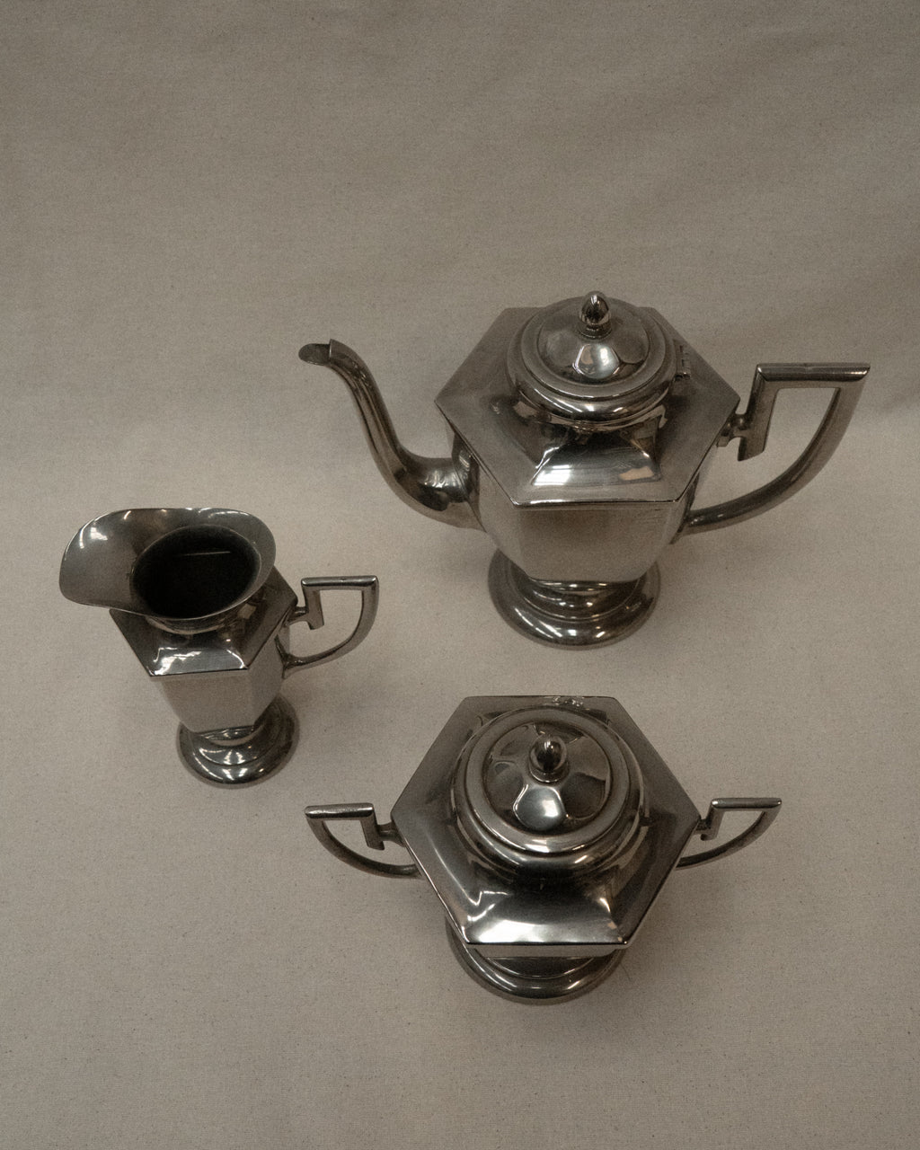 Set of chrome art deco set of coffee pot, sugar pot and milk jug