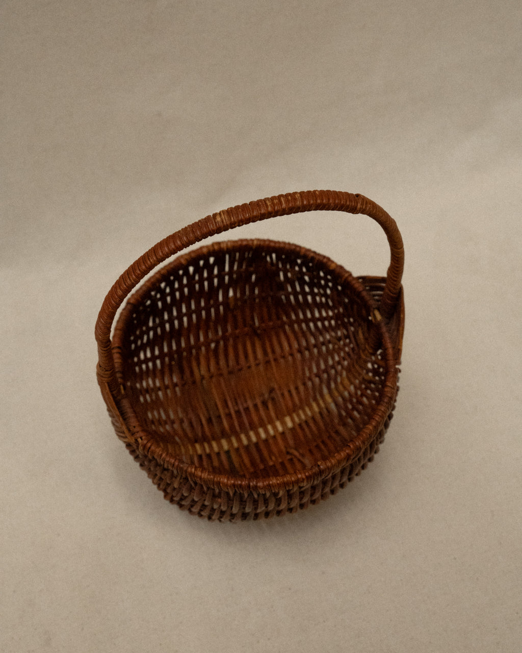 Small wicker basket with handle