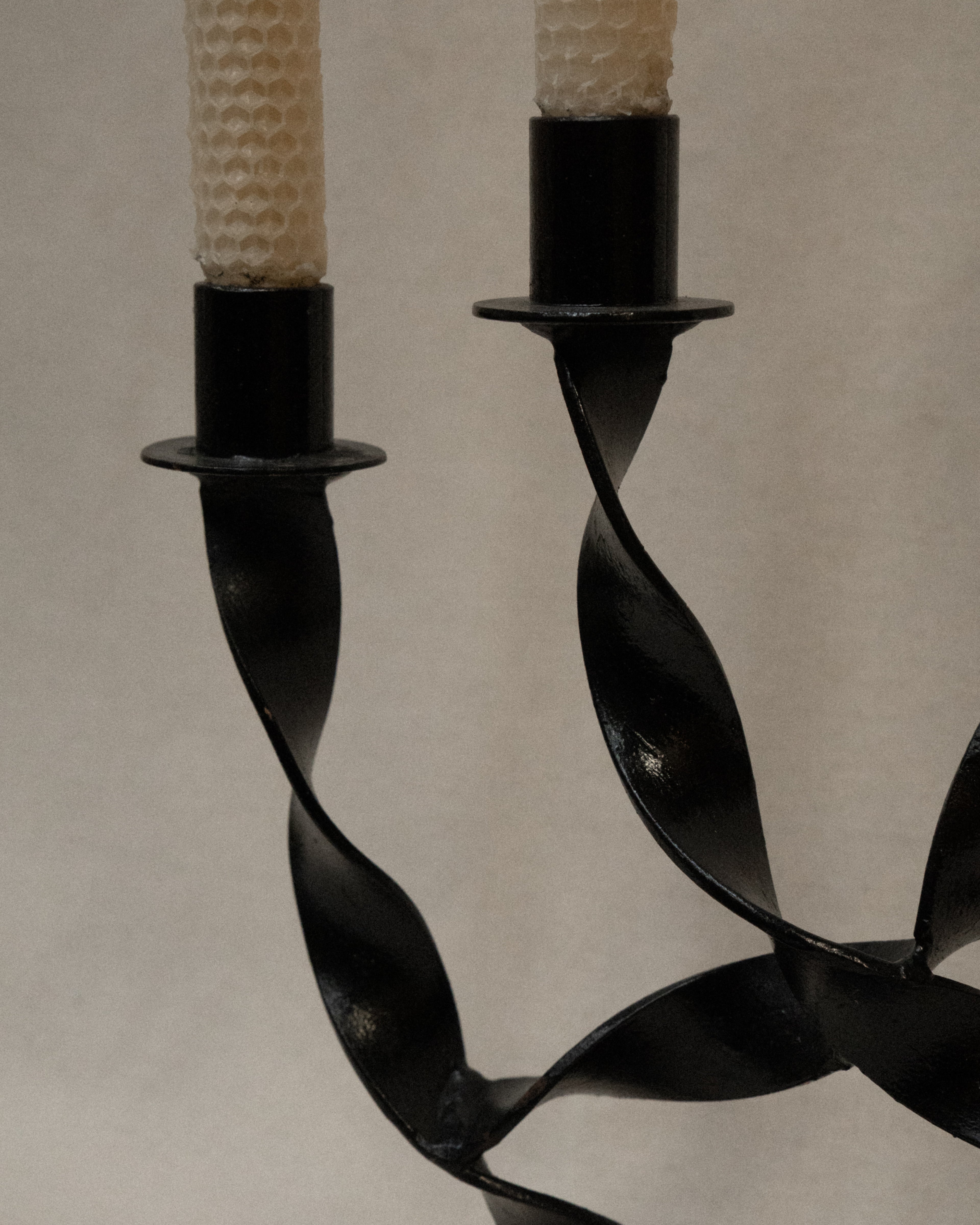 Black coated steel twist arm candelabra