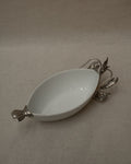 White ceramic dish with silver coloured lobster