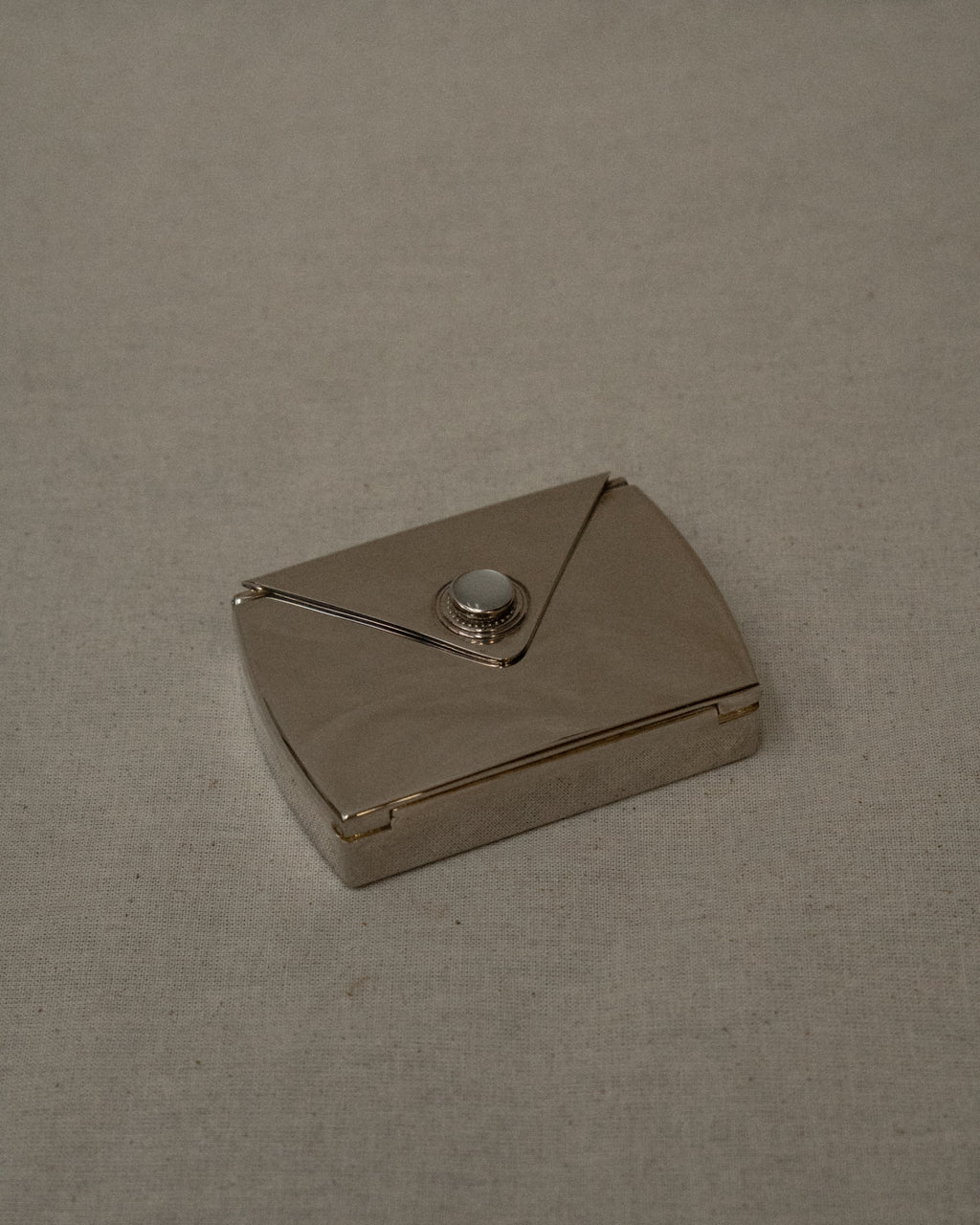 Chrome letter shaped compact case with mirror