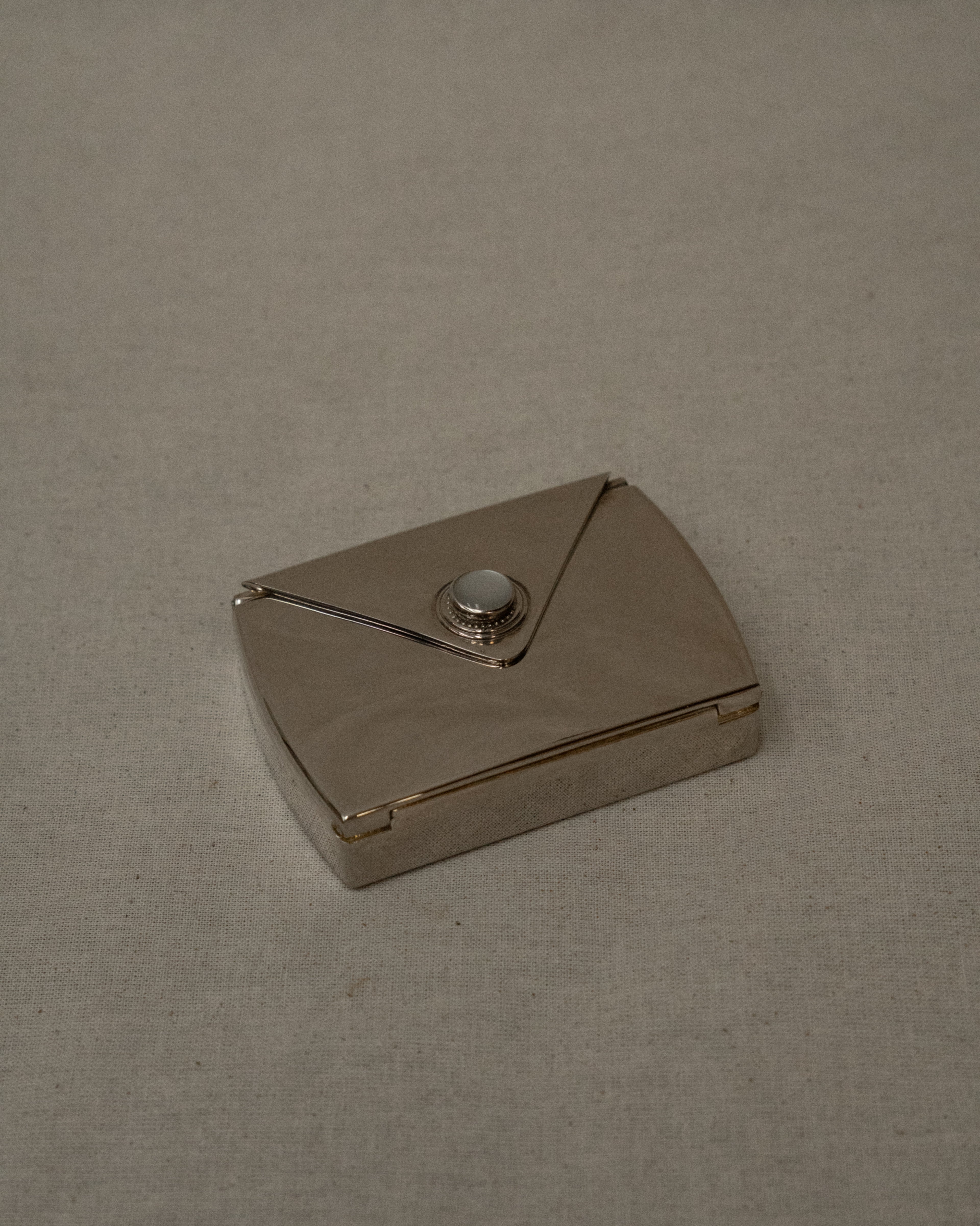 Chrome letter shaped compact case with mirror
