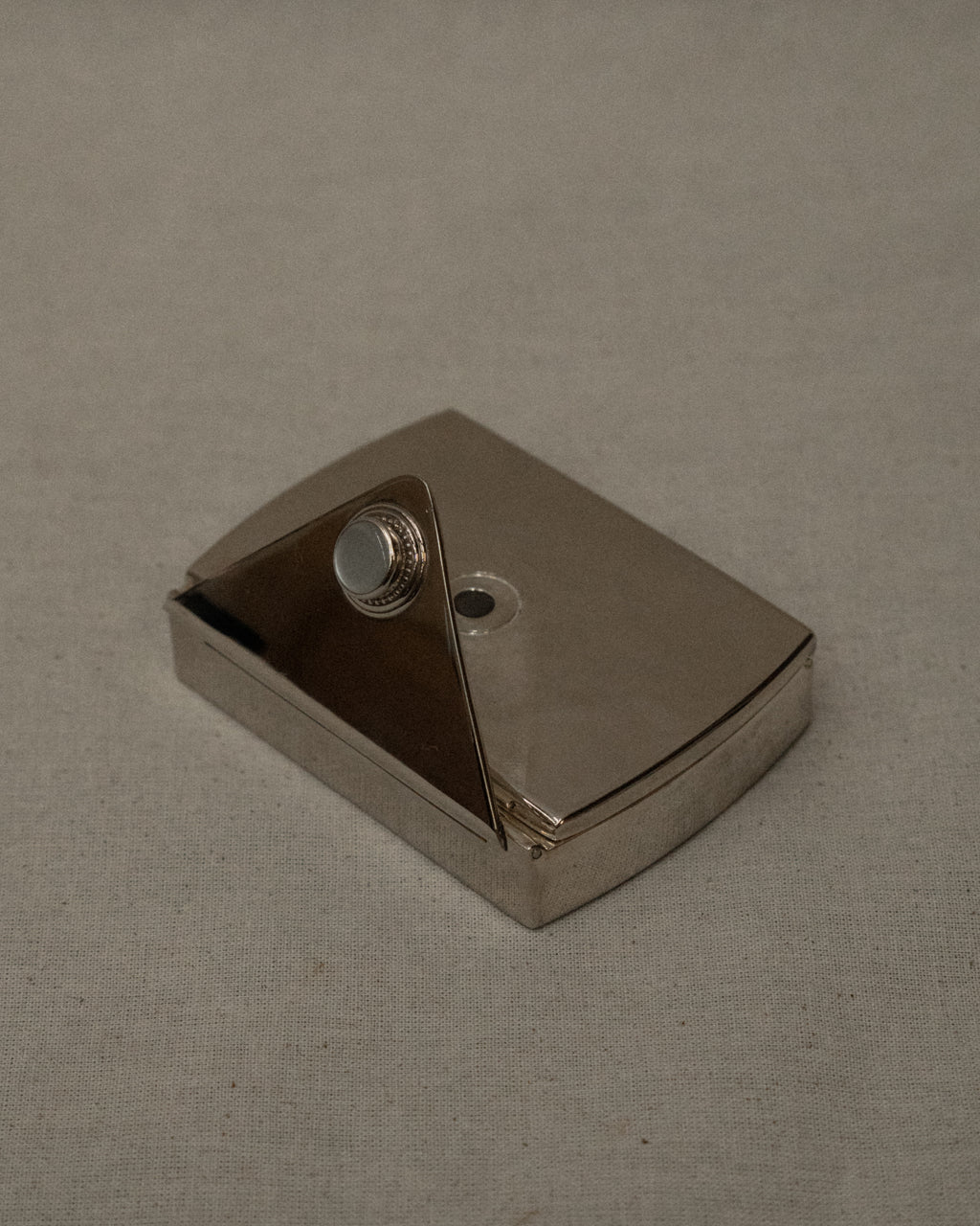 Chrome letter shaped compact case with mirror
