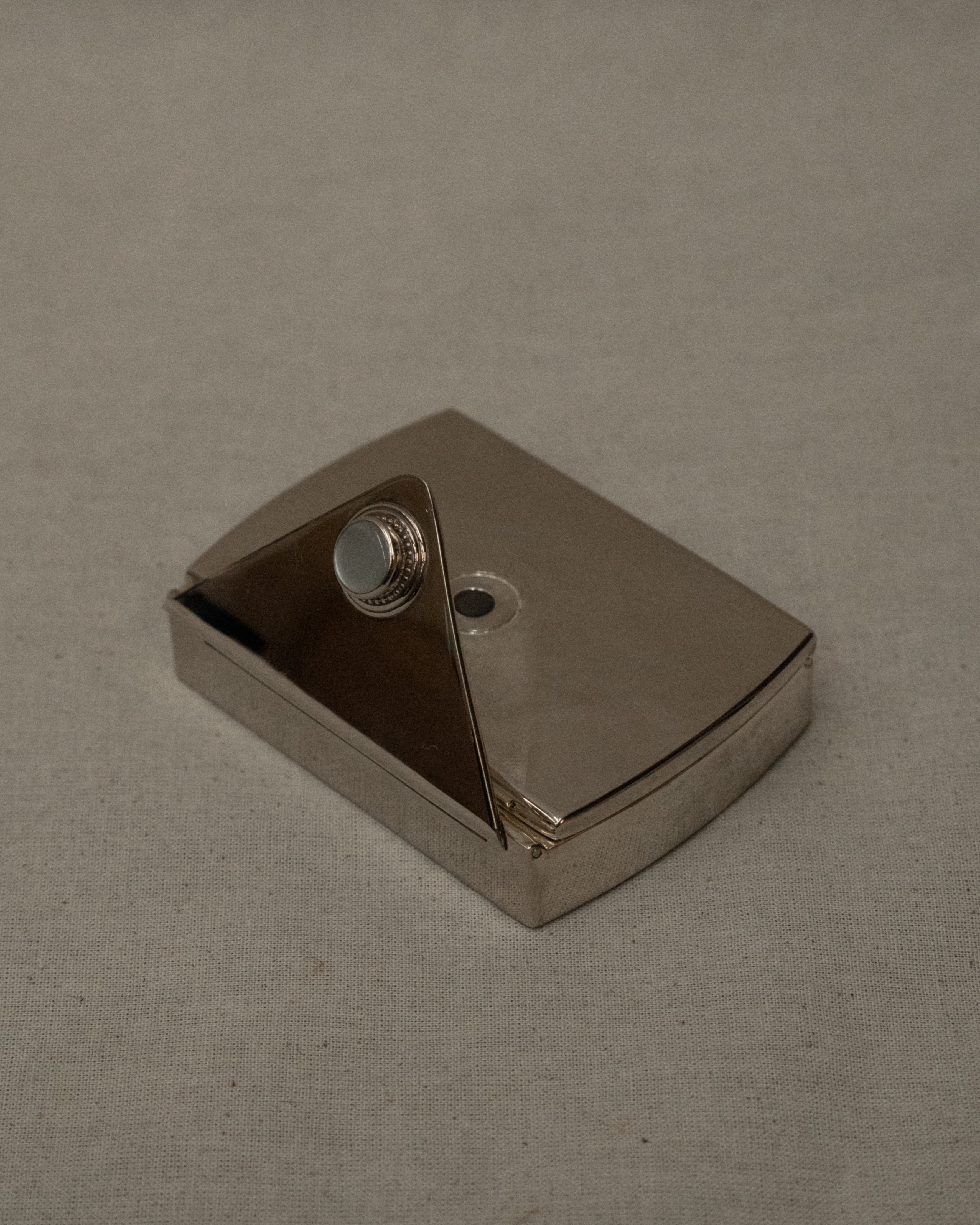 Chrome letter shaped compact case with mirror