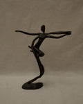 Solid metal human sculpture