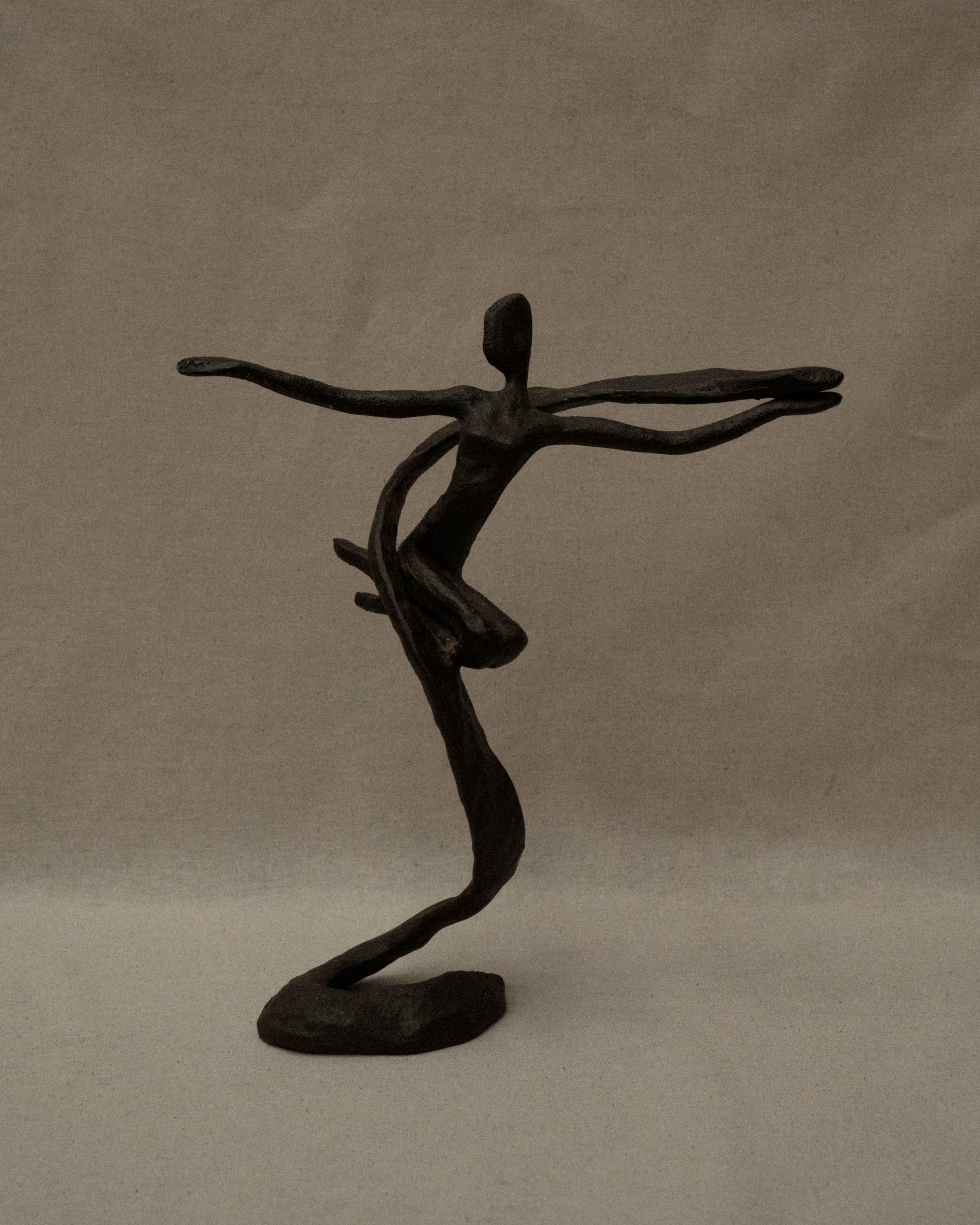 Solid metal human sculpture