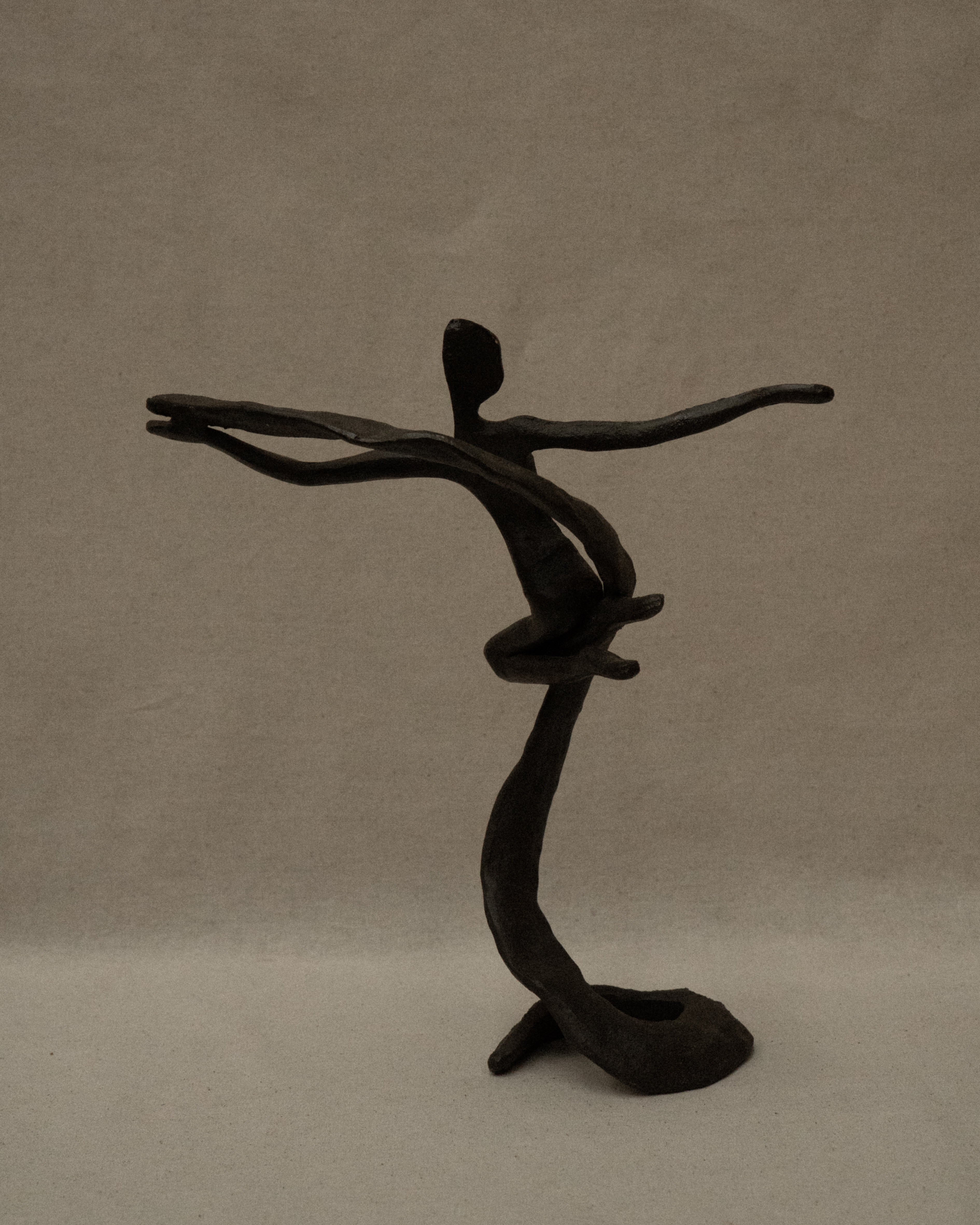 Solid metal human sculpture