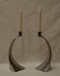Pair of curved chrome candle holders