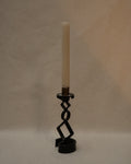 Black steel candle holder with diamond and circle shapes