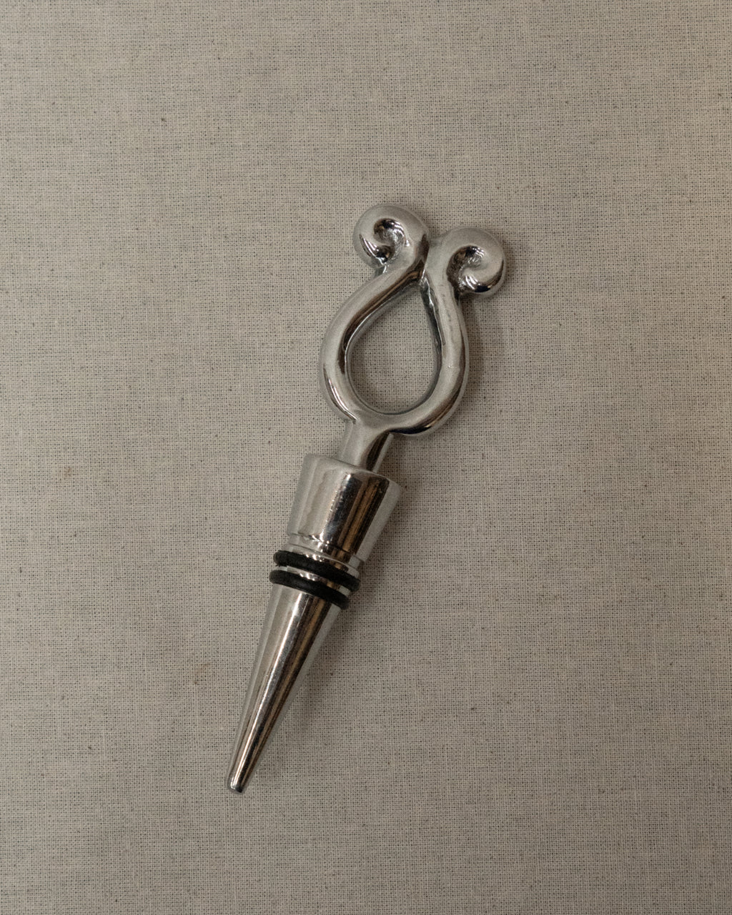 Metal wine stopper with spirals